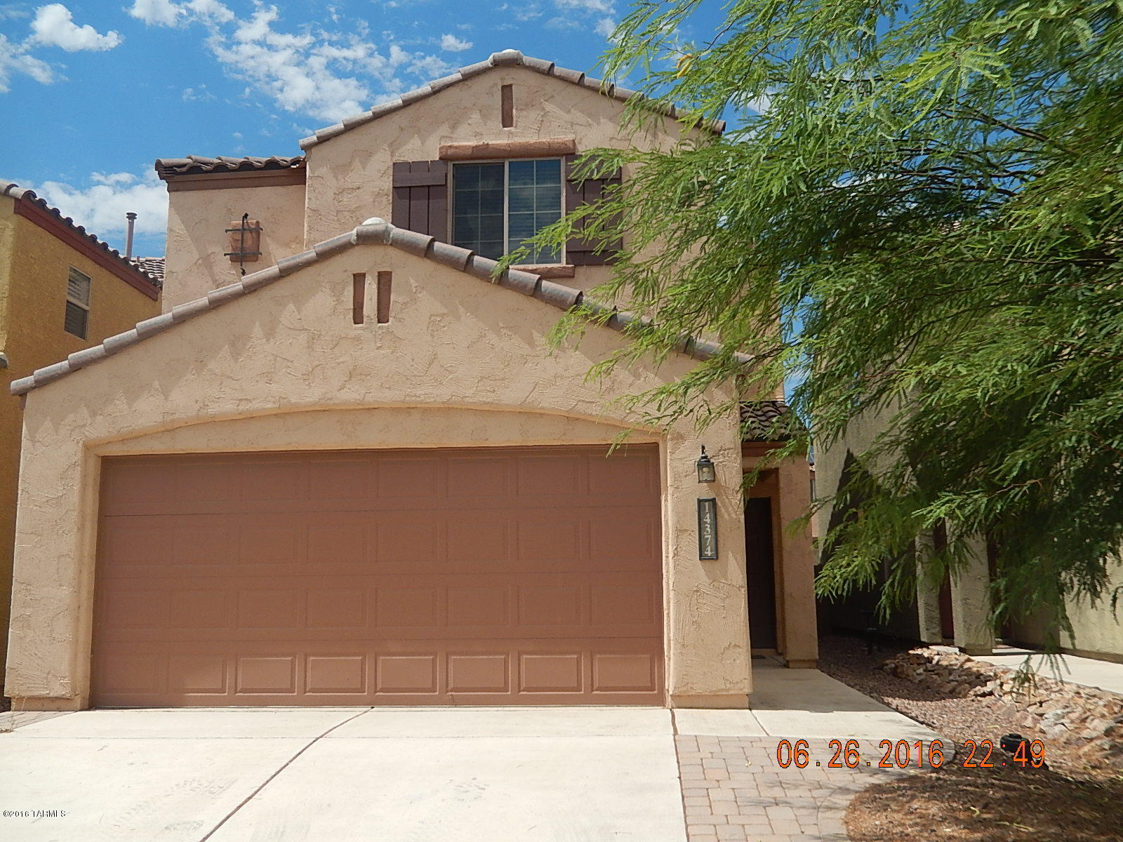 Live the Rancho Sahuarita life at a great price. Tenants who rent this home will have access to all of Rancho Sahuarita's amenities to include club house, gym, splash park, tennis courts, basketball courts, trails, and fantastic schools! This home features a wonderful light and open living space with ceramic tile floors and privacy blinds. The kitchen has appealing black appliances including brand new refrigerator, island with breakfast bar, and plenty of cabinet and counter space.  Large enough to entertain the whole family including the dog with a built in doggy door. (pet restrictions apply) Upstairs, you'll find 3 good sized bedrooms and loft space that can be used as an office, lounge, play area, etc. Laundry room will have brand new washer/dryer and is located on 2nd floor. Back yard is low maintenance with covered patio. There are so many wonderful features for this price so call for your private showing today.