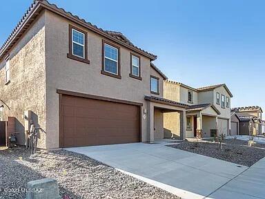 2,721 SQ FT! 5 bedroom, 3 bath home in Tucson's Rocking K Ranch! Thoughtful two-story floor plan with covered front porch + welcoming foyer entry. Charming eat-in kitchen with included appliances, & large center island/breakfast bar! Open concept living/dining, great for entertaining. Neutral interior with tile flooring in all the right places! Spacious upstairs loft provides ample additional living space + flexibility. This home offers 5 generously sized bedrooms! Upstairs primary suite with full bath + walk-in closet. Convenient downstairs secondary bedroom with optimal privacy! Blinds. **Washer/Dryer To Be Installed For Additional $50 Monthly!** Enjoy a low up keep backyard with covered patio! 2 car garage. Rocking K Ranch offers community splash pad, sports courts, playgrounds, biking/walking trails, & stunning mountain views! Great Tucson location with easy I-10 access.

Pet Policy: Dogs and Cats Allowed with the following exceptions: Pets will be considered upon approval!. $150 Non-Refundable Pet Fee per pet. A $25 Pet Rent per month per pet will be added to the rental amount (when applicable). (Service Animals - Please refer to the Resident Qualification link below)

3D Virtual Tour
https://my.matterport.com/show/?m=ZjUv9VFQsMb

Review the Resident Qualification Requirements and Fee Structure: https://www.onqpm.com/tenant-qualification-markets/

Find out how you can lower your upfront move-in costs with our Security Deposit Alternative program: https://www.depositalternative.com/
