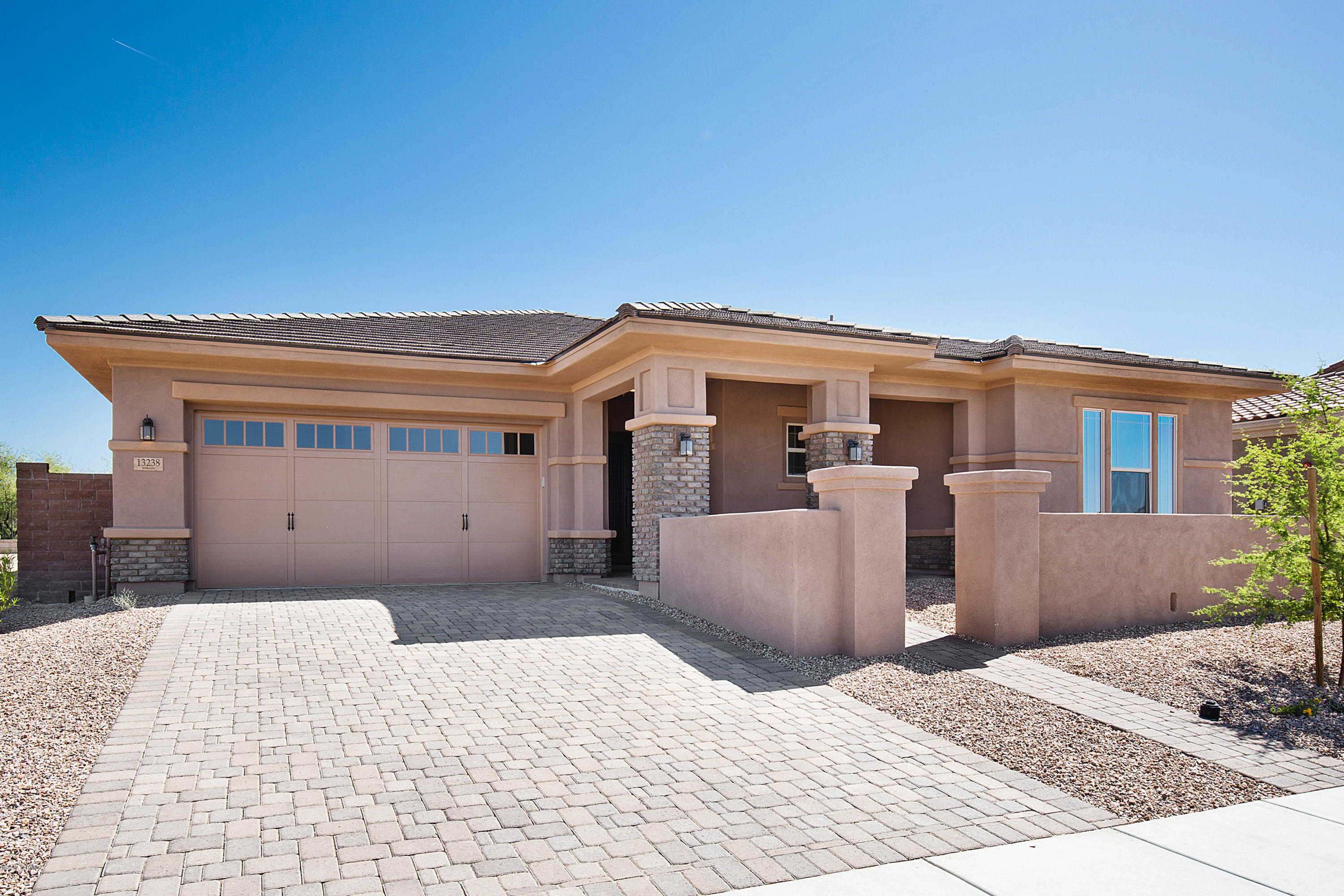 This beautiful 1 story home is located in Center Pointe Vistoso, a gated  community within Rancho Vistoso. Views to Golf Course w/ Mountain Views!  This home features a Gourmet Kitchen with Stainless Steel GE Appliances, Upgraded Granite Kitchen Counter tops in Monte Cristo, extended Nook with Cabinets,  12' Ceiling at Great Room, Walk-in Shower at Master Bath with Custom Tile, Patio Door at Master Bedroom, 12'sliding glass door at Great Room, Custom 12'' x 24'' tile through w/Carpet in Bedrooms, Iron Entry Door, Extended Covered Patio,Community Pool, Ramadas and so much more!  PURCHASE THIS HOME BY JULY 31, 2017 AND RECEIVE A GE STAINLESS STEEL COUNTER DEPTH REFRIGERATOR AND GE FRONT LOAD WASHER & DRYER!