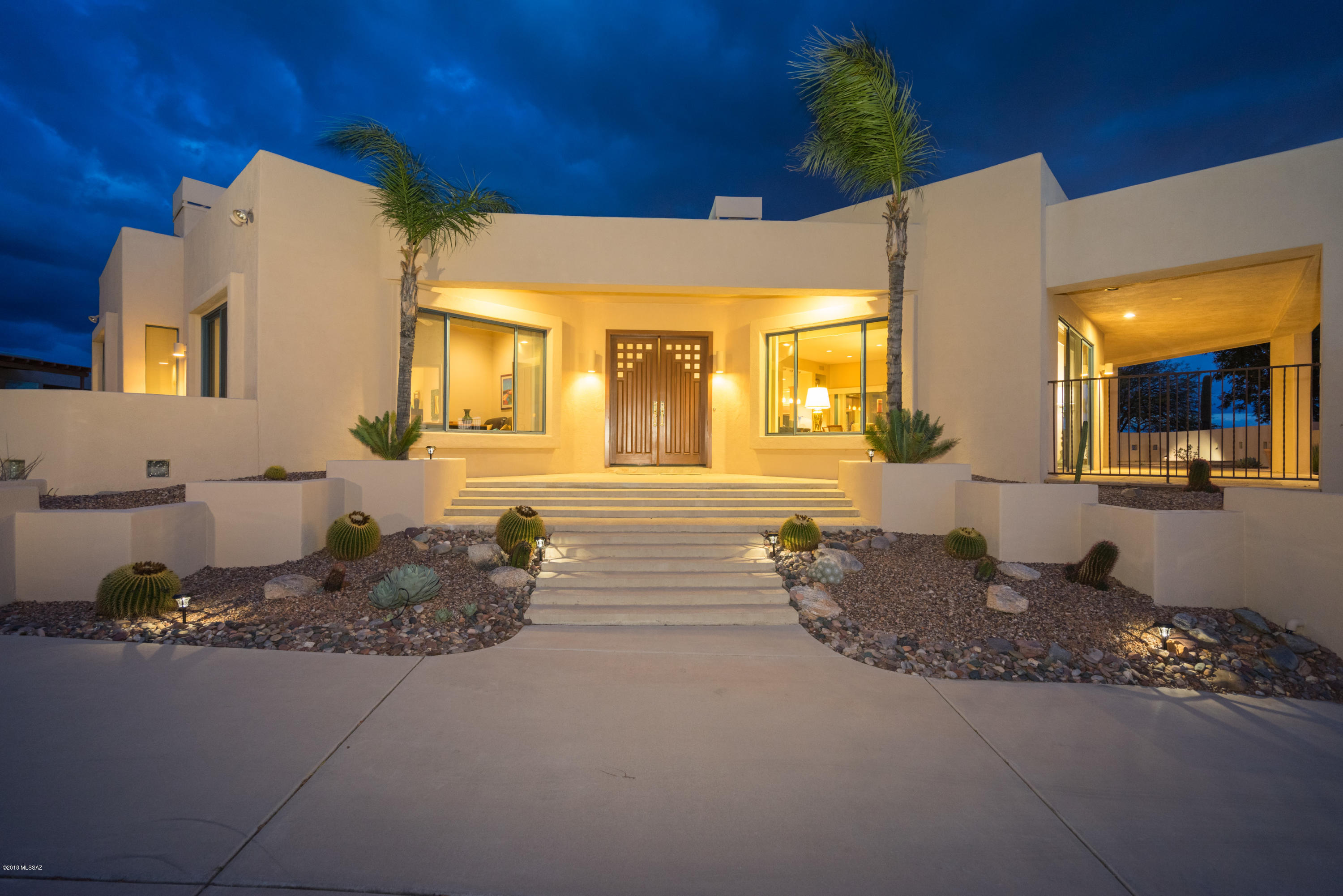 The most amazing views in the foothills! 360' views of city & mountains, both inside & out. This custom home will NOT disappoint starting with the huge gourmet kitchen, 2 subzero refrig/freezer, huge center island, Wolf 6 burner w/grill range, granite ctrs, warming drawer, double ovens, wine cooler, large drawers...the list is endless. The kitchen is open to the DR & LR and of course the vast views. Mstr bedroom has wide open views of mtns, gas FP, updated bath w/soaking tub, large walk-in shower, makeup vanity, newer cabinets & granite and a connecting walk through closet w/custom doors like you have never seen! Both guest rooms have expansive city views, one with Sabino Cyn view also w/jack & jill bath w/ granite, double sinks, stunning tub/shower. Beautiful den/office off mstr with mtn and city views...will be hard to work! The exterior features consist of a lovely spool, fire pit, huge patios overlooking those views again. Exterior recently repainted, roof recoated 12/17. This extraordinary home awaits you.