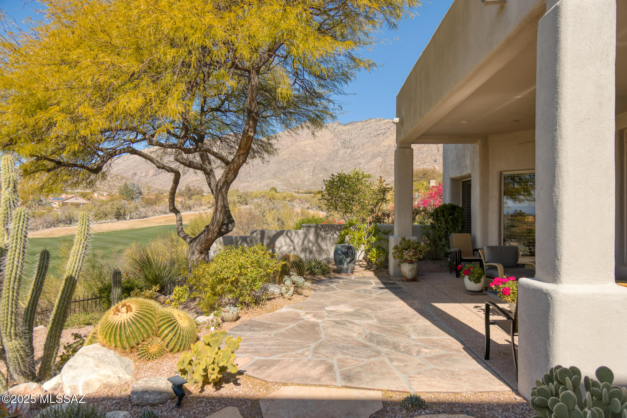Enjoy City, Mountain,& Golf Course Views From This Single Level 3BR & 3BA Masonry Built Home in The Coveted Enclave of The Ridge at Ventana Canyon. Perched on a Private Lot High Above the 12th Fairway of the VC Canyon Golf Course This Homes Fine Features
Include: Charming Courtyard Entry, High Ceilings & Oversized Windows Offering Plentiful Natural Light - Great Room w/ Stacked Stone Fireplace - Island Kitchen w/Granite Counters + Breakfast Bar & Nook - Formal Dining Area - Split Bedroom Plan w/ Primary Suite, Additional Guest En-Suite, and Office/3rd BR - Outdoor Living Space w/ Covered Patio, Exquisite Desert Landscape, City, Mountain, Golf Course, & Sunset Views. This is The Best of Resort Style, Easy Lock & Go Living!