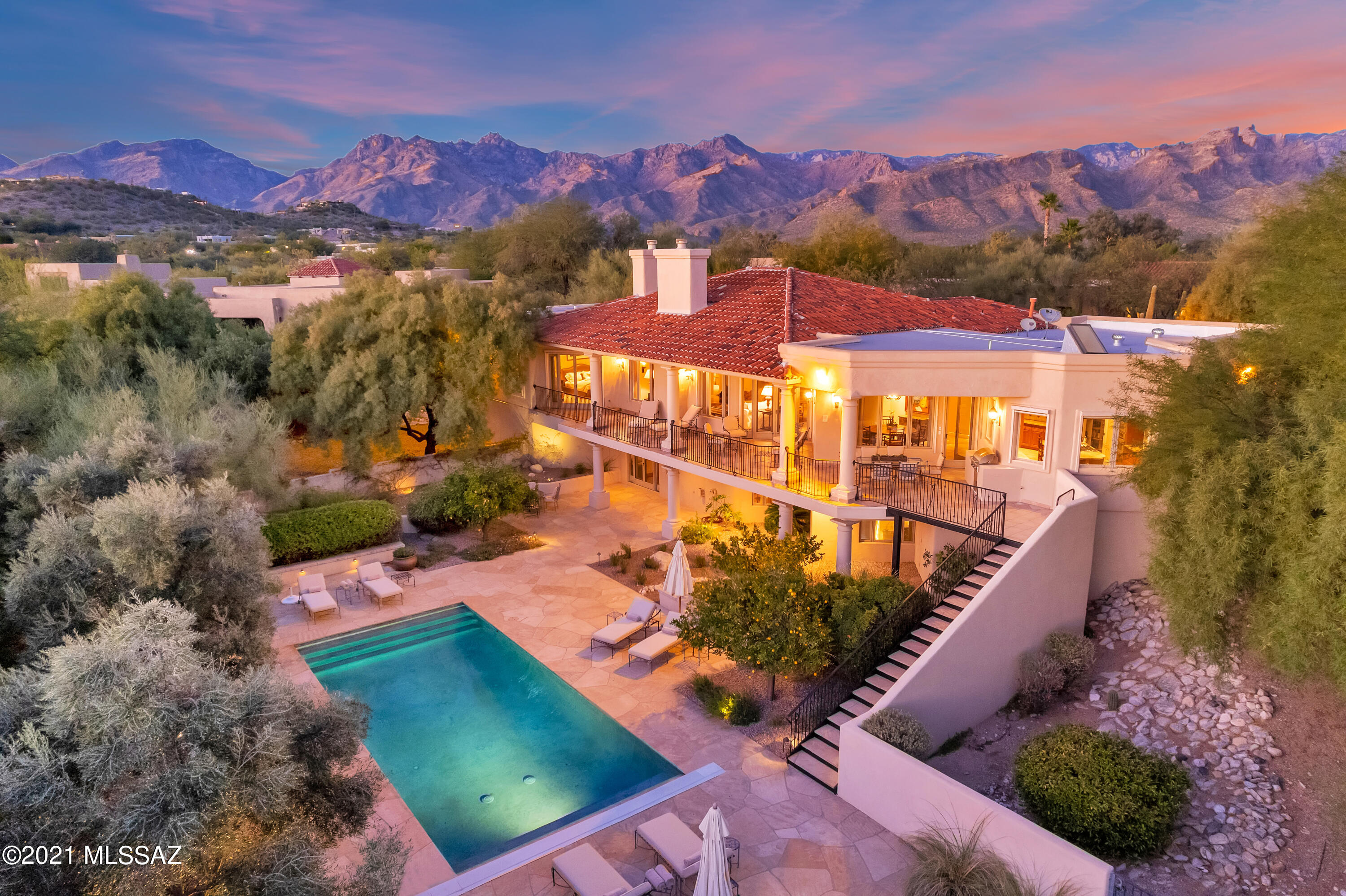Superb Modern/Mediterranean and Southwestern architecture tastefully blended on the pristine grounds of Canyon Ranch world-renowned Health and Fitness Resort .Sitting on a half heavenly acre tucked away securely behind the resort gates, it boasts three bedrooms, master bathrooms suites, open floorplan living room that smoothly flows into the kitchen ,dining and the foyer area on the first level. 
Comfortable landing to the lower level for a spacious entertainment room, wet bar, guest bedroom, bathroom and utility room providing total guest privacy.  Floor -to-ceiling French doors opens into the Swimming Pool deck with easy access to the backyard and the upper level balcony with built-in barbecue grill and the Rincon views. to entertain your guests. Use it as your permanent residence or as your vacation sanctuary while experiencing a total immersion in the state-of-the-art gym, bodywork, fitness classes around the clock , hiking, cycling, yoga, meditation, access to the Two-mile-loop for you morning or sundown walks. Use the dedicated physicians to guide you through your wellness aspirations. Enjoy healthy cuisines in one of the fine dining venues. Follow your dreams through a healthy living lifestyle as everything is at your fingertip.