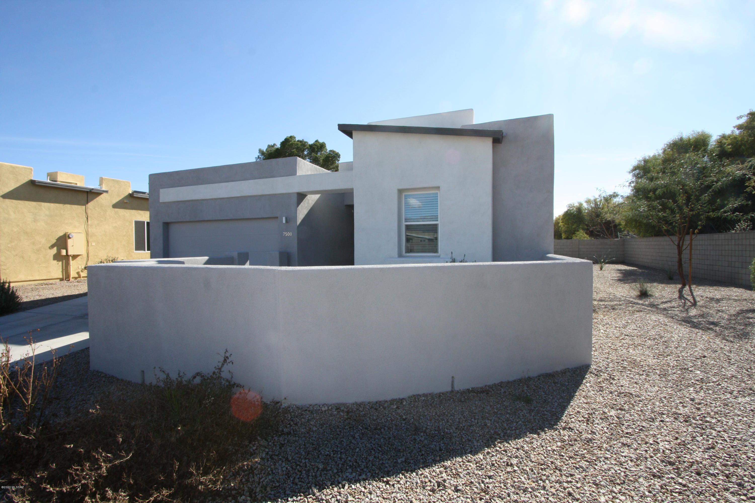 Stunning 3 bedroom/2 bath home built in 2018! Desirable NE location borders Udall Park and is minutes from shopping. Premium corner lot on cul de sac with courtyard and mountain views! Open floor plan with granite kitchen and bay window breakfast nook. New Pepper Viner smart home that is energy efficient and features home automation with Nest thermostat. Luxurious master suite boasts , dual vanity sinks, walk-in shower and huge walk in closet. Split bedroom floorplan, fenced backyard w/extended covered patio! Owner is a licensed Real Estate agent in AZ. Assistive cats only.