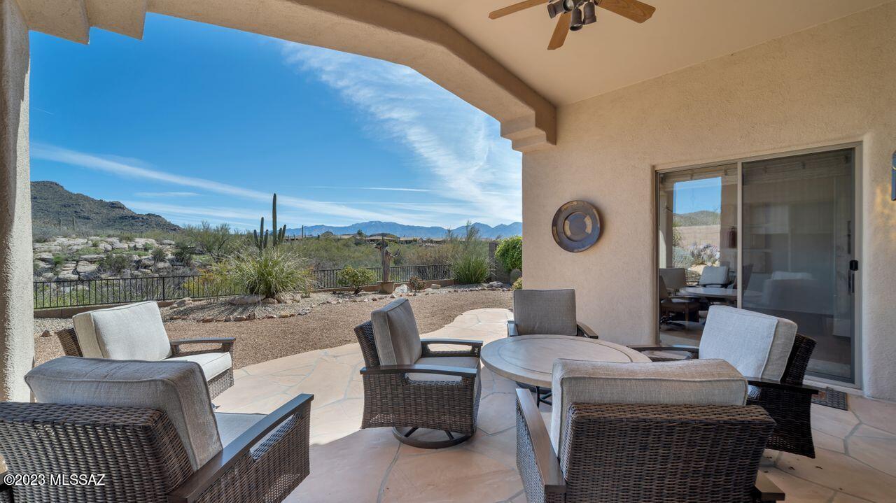 Completely remodeled AF Sterling home with unobstructed Catalina & Tortolita mountain views, plus rock outcroppings that are jaw dropping the minute you walk into this stunning home! Stacked Travertine accents on the exterior garage walls. Open great room and dining room offers wall of windows with wood flooring.  Kitchen boasts new cabinets and tile, 5 burner gas range, wine fridge, breakfast bar, quartzite Taj Mahal countertops. Spacious dining area w/ views. Master suite offers: patio access, custom walk in closet, remodeled bath with enlarged shower & dual sinks. Bedroom 2 has walk in closet and shares bath with Bedroom 3. Laundry room with cabinets. Garage offers a sink with built-in cabinets. Come see what this special home has to offer. Call for private showing !