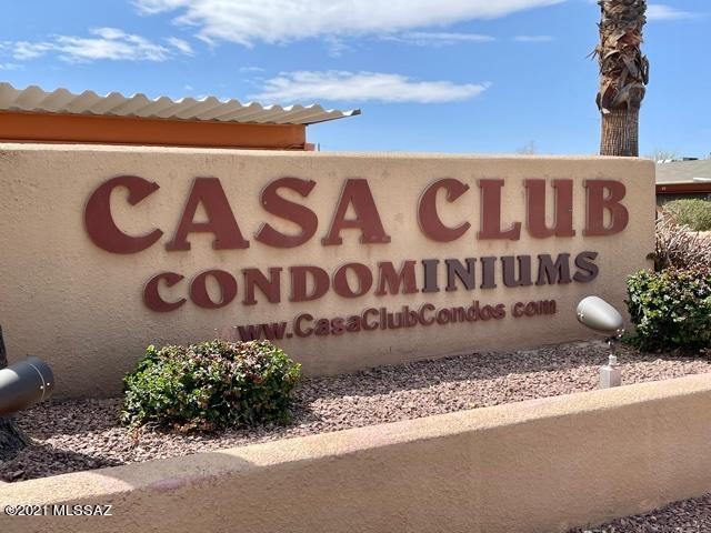 Beautifully updated condo in the gated Casa Club Condominiums!  This stylish home features new wood tile floors, fresh paint through out, new base boards, and new recessed lighting.  A rare find with 2 Bdrms and 2 full bathrooms. The dining room is open to the great room and has a view of the pool.  There is a lovely kitchen with warm cabinets and stainless steel appliances.  The great room area has a sliding glass door out to balcony (and extra storage closet!).  Lots of amenities including a pool, spa, tennis courts and much more! All of this in central Tucson and close to everything.