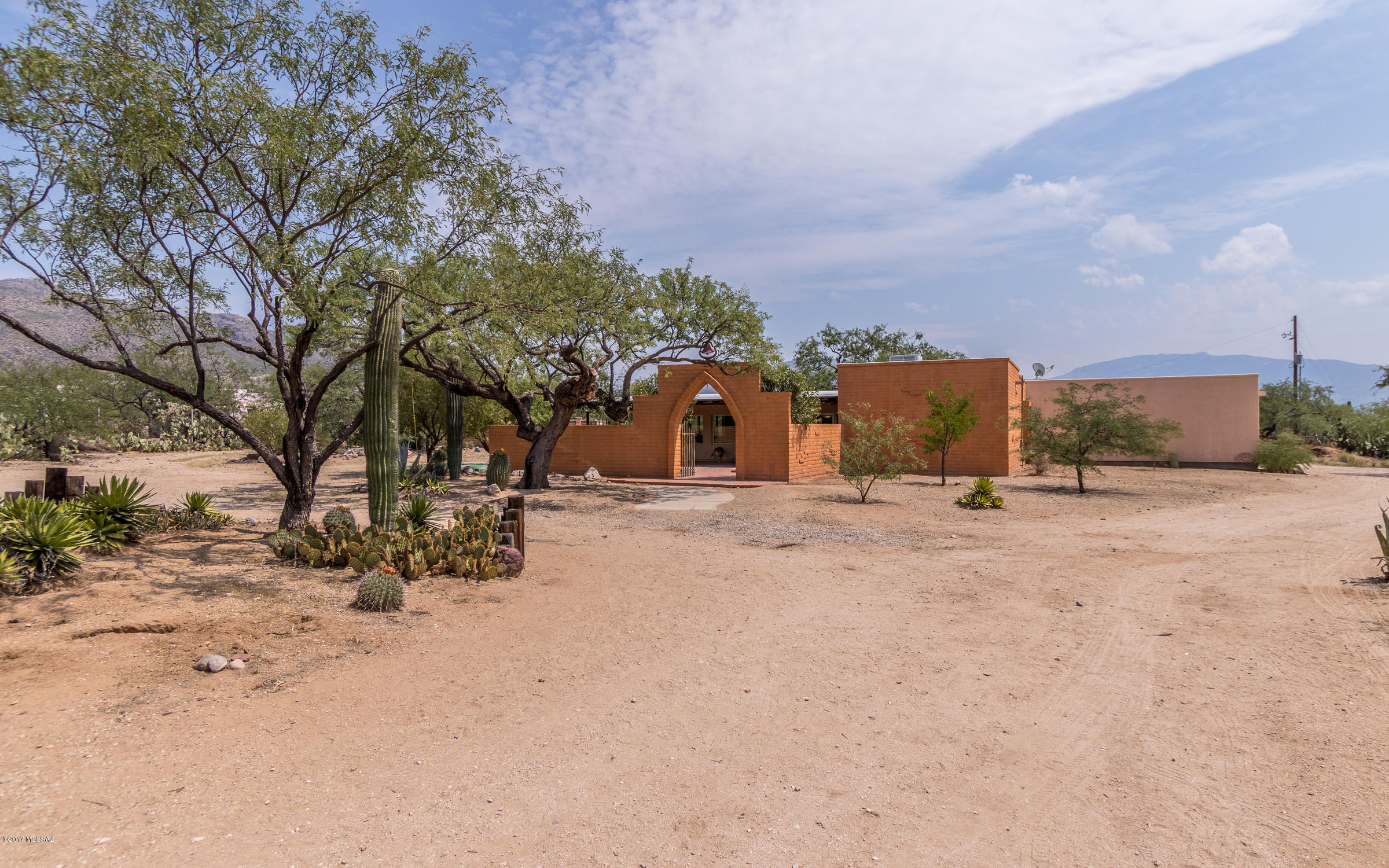 You’ll love this property!  3.3 acres of private, fully fenced, useable flat land with pool.  The home features 3 bedrooms, 2 full ​baths, plus an area for an office.  Large master bedroom with a huge walk-in closet. Large kitchen perfect for entertaining ​with birch cabinets, granite countertops, 2 dishwashers​ and ​copper backsplash. Kitchen opens up to a large living space. Great room has lots of natural light and large picture windows that face out to the Catalina mountains.  Enjoy the mountain views from inside or from the wrap around porch. Horse facilities are extraordinary with masonry block construction, 12x24 tack room with overhead garage door, 50x120 pipe arena. Pebble-tec pool with flagstone style concrete decking. Dual pane windows, newer HVAC system, No HOA & No CCR's so bring your toys!