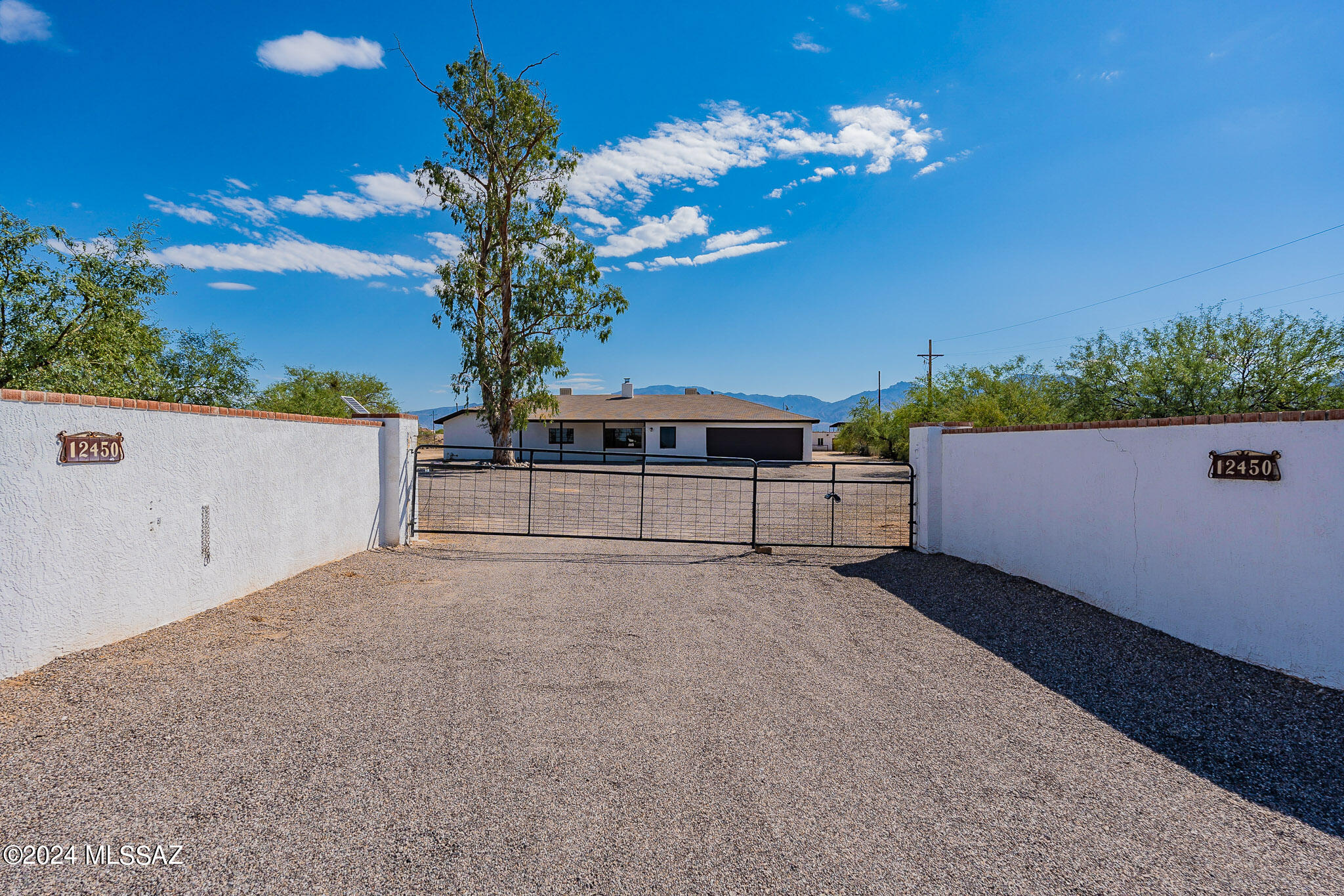 PRICED BELOW APPRAISED VALUE! Here's an opportunity to make this house your home with room to roam...inside and out! Endless potential to unlock with this 4433 sq. ft. home on 9.11 acres with a private well, 30'x30' detached workshop with 220V and 110V and fabulous mountain views. This property offers incredible possibilities for those with a vision. Whether you're looking to create your dream estate, invest in a lucrative project, or simply enjoy the peace and privacy of wide open spaces, this home provides a rare opportunity to make it your own.  Don't miss out - schedule your showing today!