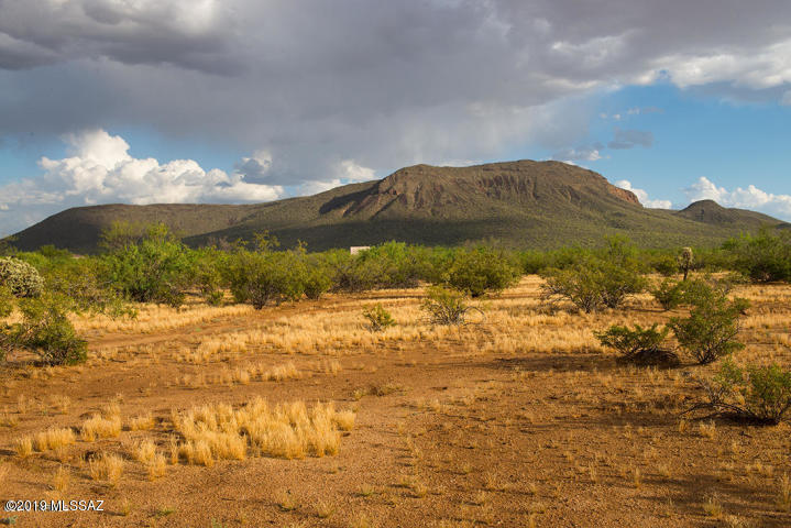 2.02 acres of vacant land lends itself to a variety of use. Ideal for horses, adjacent to open desert to the South and West. Close to the Casinos and Valencia Rd. View of Black Mountain, quiet area with plenty of potential for growth.  Seller will do a Carryback!