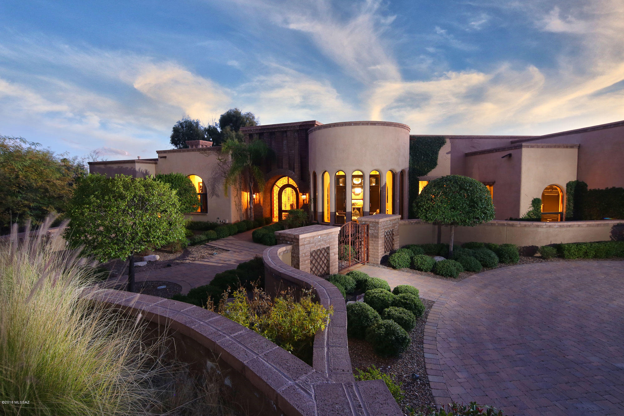 CUSTOM home built by John Kline, over 6700 sq.ft of pure excellence and quality. Beautiful City, majestic
mountain, golf course and sunset views in Skyline Country club.  One level - no interior steps, each bedroom has private bath, separate powder room, high coffered ceilings, great room concept, media room, gourmet open kitchen with butler's pantry, subzero and wolf appliances. Formal dining room has wine refrig and dishwashers. The lavish spa like master bath has steam shower and waterfall feature tub, his and her closets, toilets & bidet. Enjoy the city/golf course views from the outdoor living space, kitchen, pergola with fireplace, pool & spa.  Lavish master bath has steam shower & waterfall feature tub, his & closets and toilets. Guest house has separate entrance.BEYOND GORGEOUS!