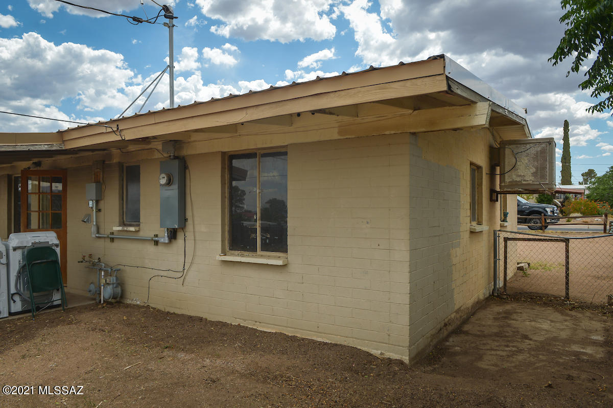 Affordable living in this quiet town of San Manuel. Only a 60 minute drive from Tucson or Florence. Seller was in process of remodel with new kitchen cabinets, counter tops and flooring in kitchen and living room. Completely fenced in back yard just needs a little TLC and paint to make it your own. Great for a young family, retired couple or Investor seeking great positive cash flow. Seller giving buyer a 2,500 credit at closing for a new furnace. Home being sold AS-IS. No warranties or repairs.