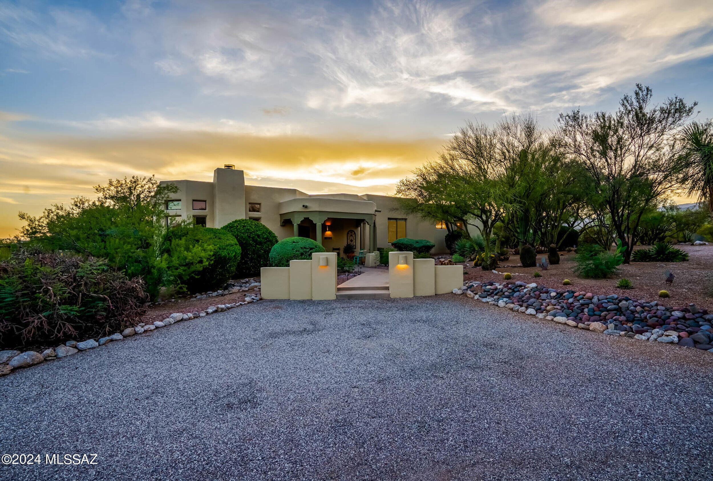 BACK ON MARKET! Buyer's financing fell through. VIEWS VIEWS VIEWS! Beautiful home in the sought after Tanque Verde valley connecting with 49er's Country Club. Bright and spacious great room concept with picture windows and separate family room with exposed beam ceilings. Beautifully remodeled kitchen with high-end cabinetry, island, granite counter tops, and stainless appliances. Large primary suite with brand new remodeled bathroom, and private patio with hot tub. Hard to find attached ensuite, perfect for guests. Entertainer's dream yard with expansive patios and wood deck overlooking sparkling pool and Aw-mazing mountains views and twinkling city lights from this elevated lot. This one wont last long! Must see!