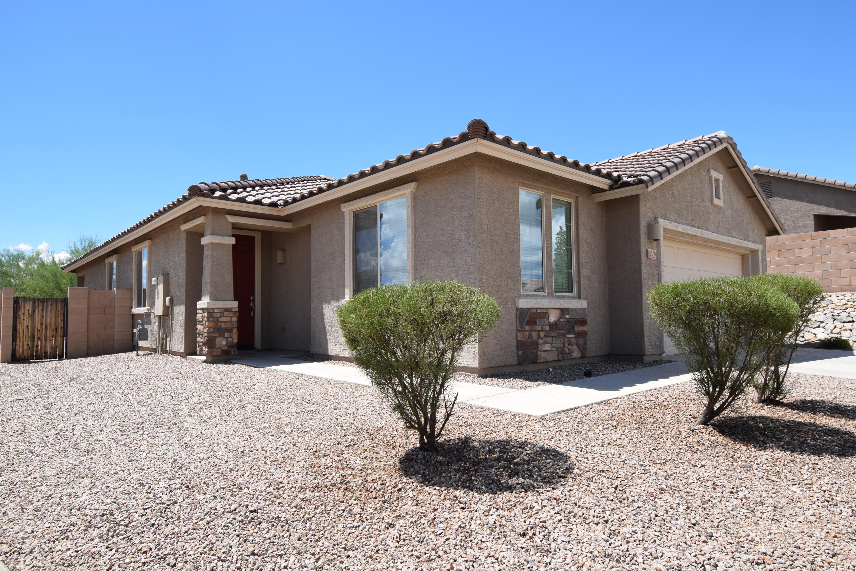 Gorgeous 4bd/2ba corner lot in desirable San Lucas! This beauty has all the upgrades throughout the home including a gourmet kitchen with all stainless steel appliances, granite counter tops, 18'' tile flooring, ceiling fans, security system and pest control defense system. Split floorplan/ Master bedroom separate from 3 other bedrooms. Pavers in back yard for minimum back yard maintenance! Fast & Convenient access to I-10 and The Marana Outlet Mall. Come see this MOVE-IN ready beauty before it is gone!