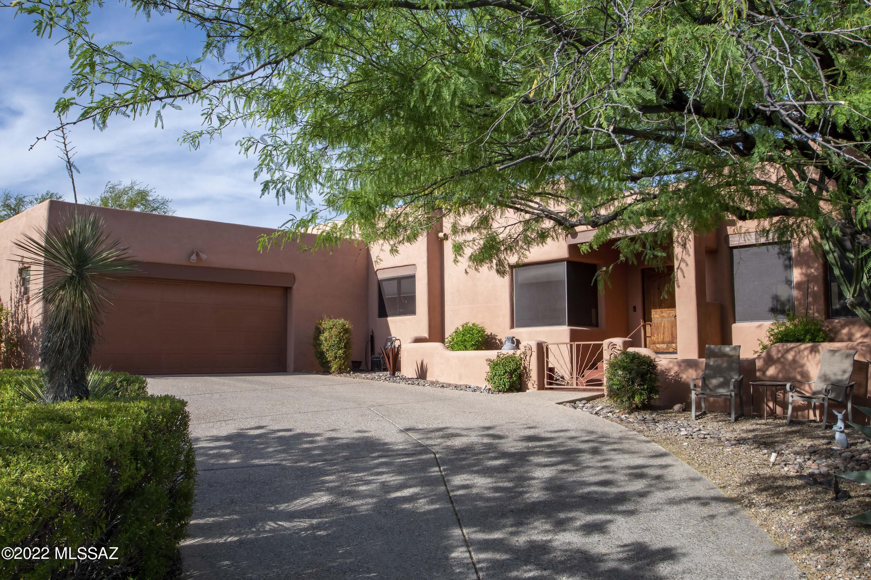 Views, views and more views from this oasis backyard.  Beautiful interior that welcomes you in as soon as you walk through the front door.  Split bedroom plan offers you privacy.  Master bedroom and den have built in cabinets that are just waiting for you to make it yours.  Views from all windows to take in the Catalina mountains with north easterly views.  Large 2 car garage has extra space and a ramp into the house.  Saltwater pool and spa has an in ground cleaning system.  NO HOA.  Meticulously maintained home by original owner.  Listing agent is related to Seller.