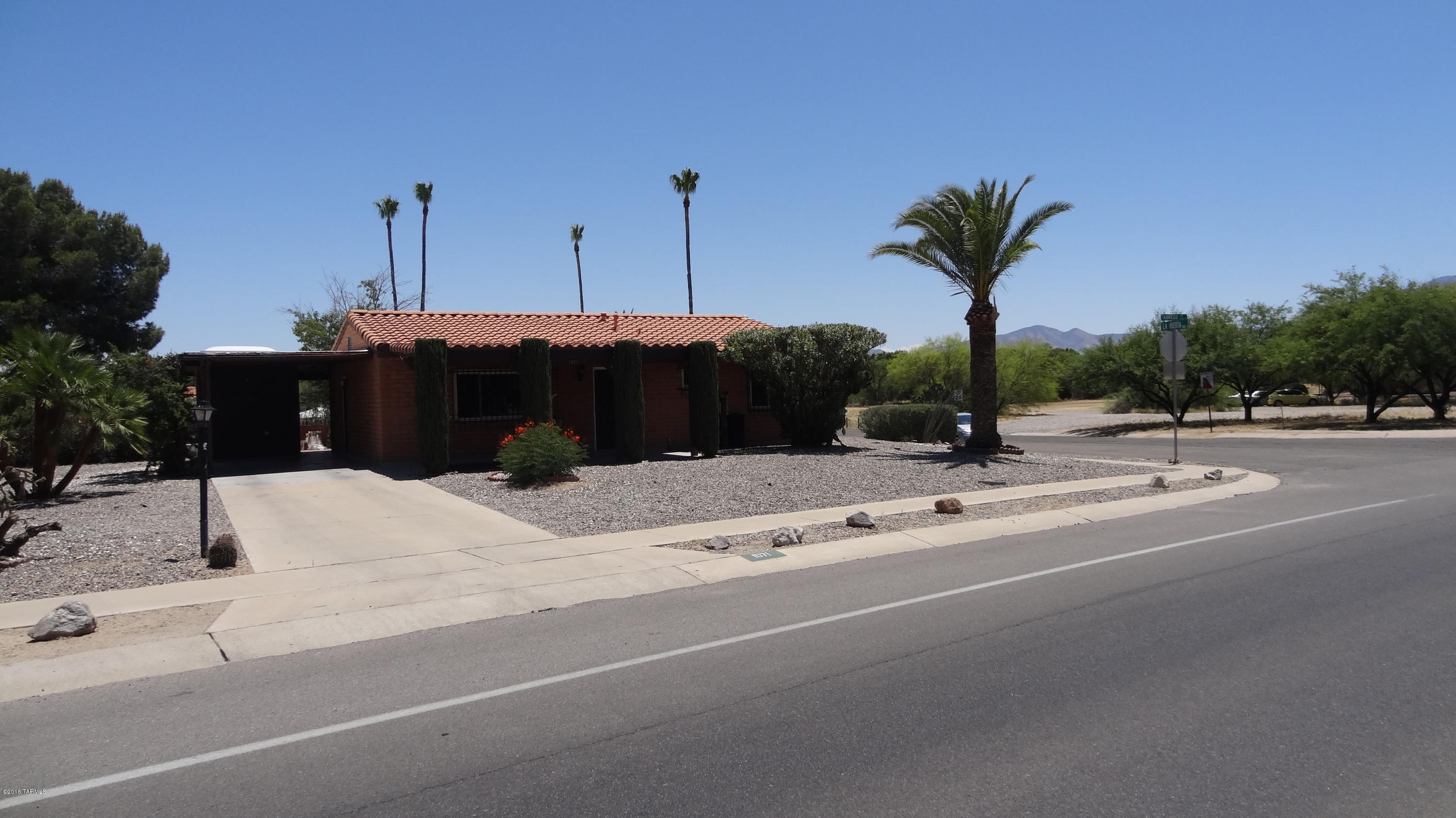 Large Corner Lot that can accommodate a two car garage. Back Covered Patio offers Santa Rita Mountain views.
Bathroom showers have just been tiled.
Kitchen freshly painted a neutral color. HVAC is 3years old; New Electrical Panel.
Great Location to the Desert Meadows Park, shopping and expressway.The Listing agent is related to seller. The Listing Agent has no ownership of this property.