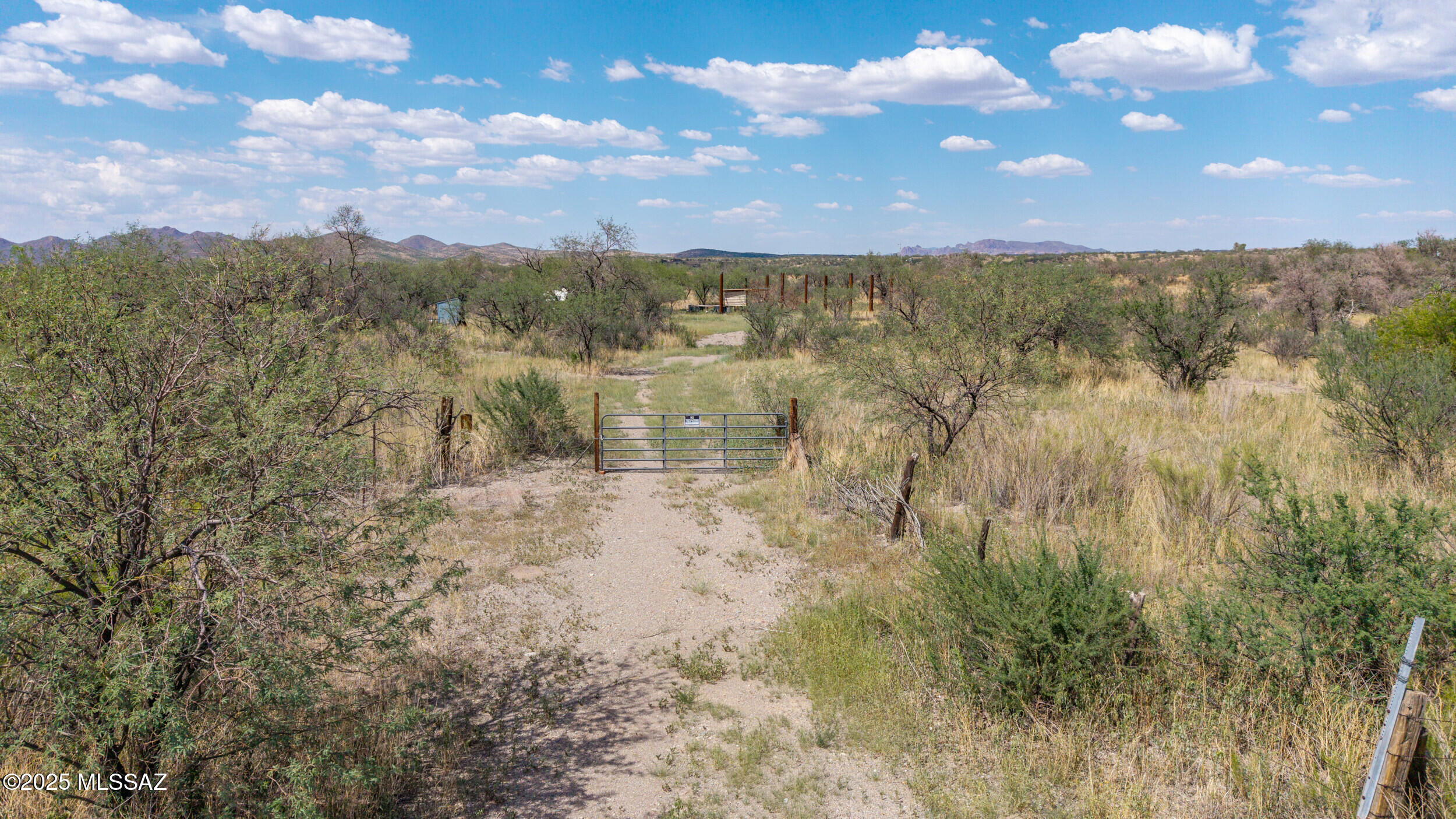 Discover wide open space and endless possibilities on this 20 acre parcel! Surrounded by views of Baboquevari and Las Guijas Mountains to the northwest and the San Luis Mountain foothills to the south, its the ideal spot for your dream homestead, ranch or retreat. This property if fully fenced, has 2 washes that run through it, and offers multiple potential build sites. No need to drill, there are 3 water lines with frost proof hydrants on site that come from a shared well. Come and enjoy quiet nights around the fire with a Milkway light show above you on this slice of heaven.
