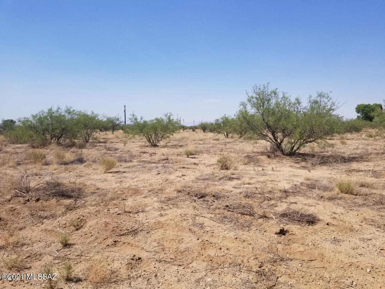 Flat usable 5 acre lot with gorgeous views.  Build or bring your your dream home here.