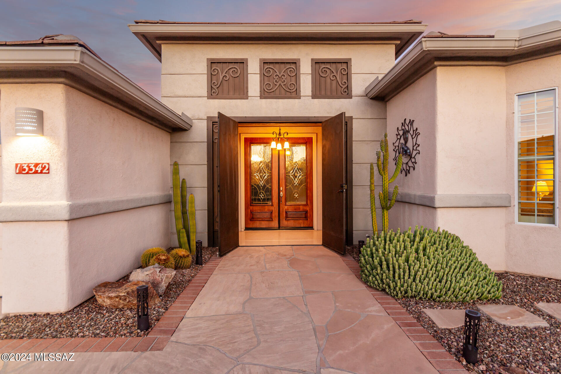 Discover your peaceful haven in this beautiful home nestled amidst breathtaking mountain views. Enjoy unobstructed vistas of the 12th fairway, providing a serene backdrop for your daily relaxation.

This spacious 2,542-square-foot former model home offers three bedrooms, two baths, and a versatile den/office. The thoughtfully designed layout includes a larger laundry room/craft room, perfect for hobbies and creative pursuits.

Experience the luxury of a recently updated master bathroom and the durability of LVP flooring. The home's eastern exposure ensures ample natural light and a refreshing breeze.

Enjoy the convenience of premium location and the unique character of this one-of-a-kind property.  Great amenities. Gated  55+ community