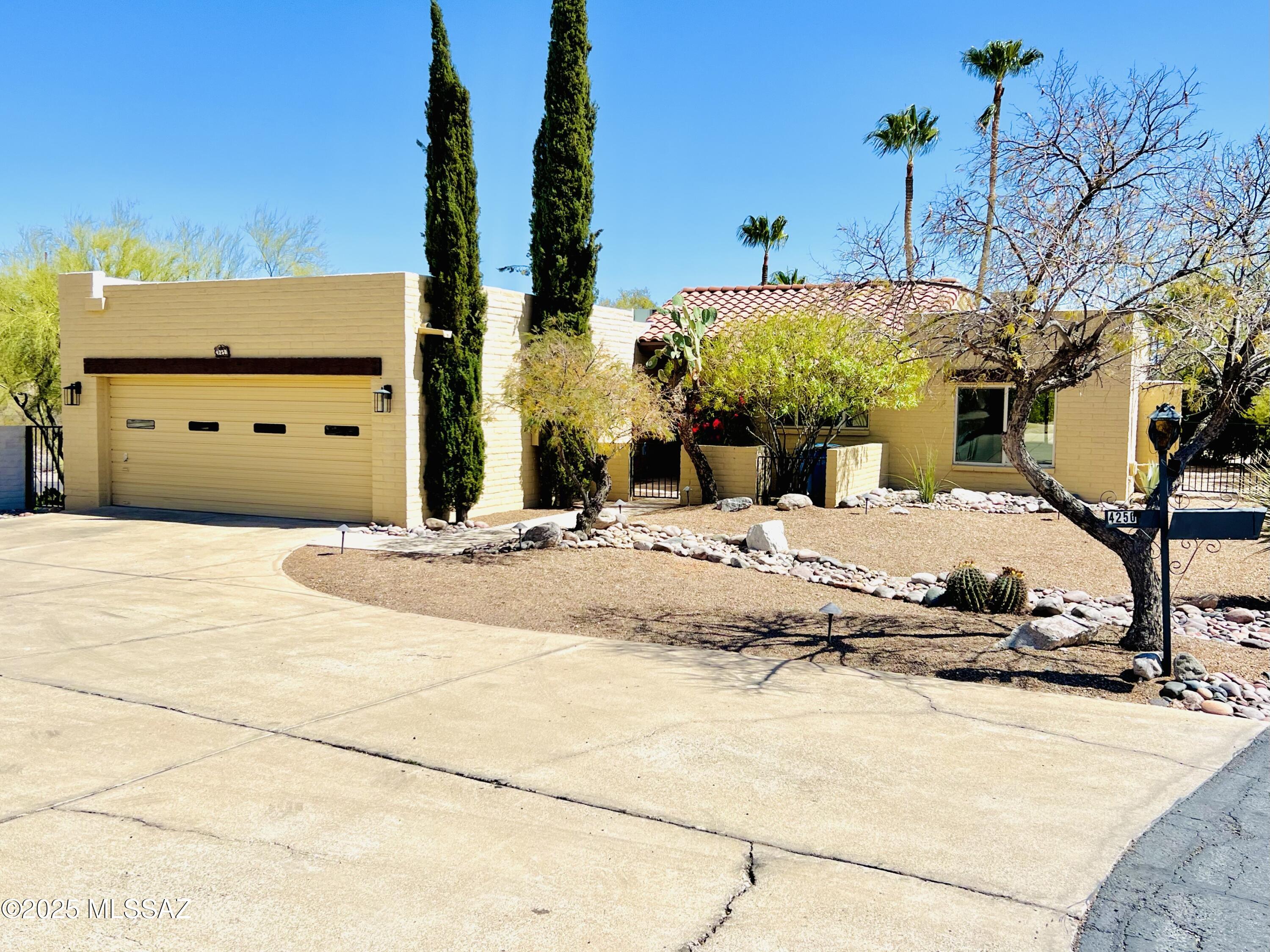 Experience luxury living in this completely renovated adobe home located in the prestigious gated community of Pontatoc Estates.Set on an elevated oversized lot,this property features a stunning pool with a pebbletec finish,concrete benches and water feature, perfect for entertaining with sweeping views of the Catalinas raised deck by the pool.The home boasts a brand-new Chef's kitchen, 2 new AC units ,paint,pebbletec pool,floors,doors,cabinets,light fixtures,new baths.No detail was overlooked. Turnkey-spotless laundry room, new interior doors, and an office created from previously u