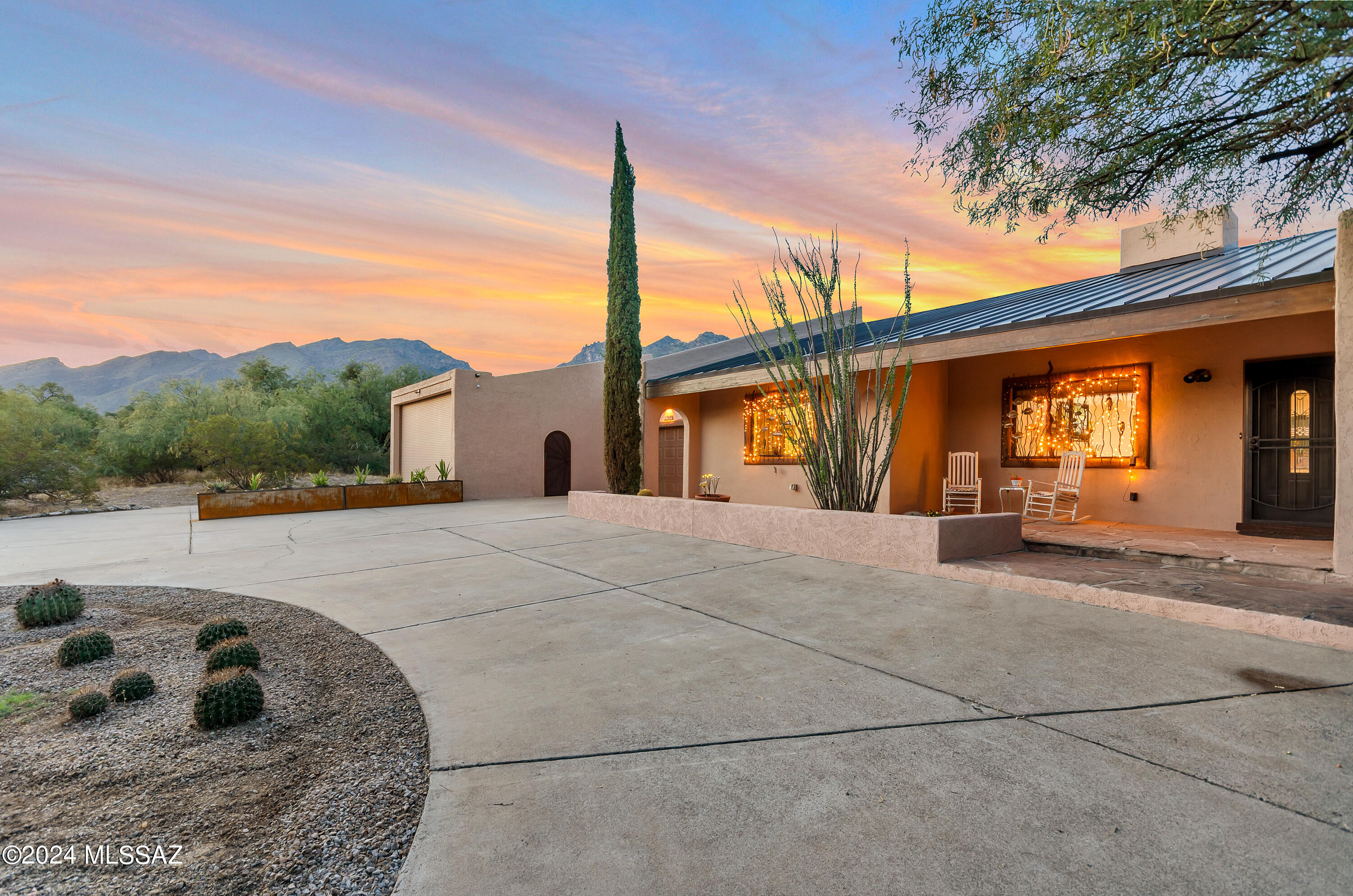MOUNTAIN VIEWS! Step into the Great room w/soaring ceilings & an abundance of natural light! Beautiful new sliding glass doors lead to an oversized covered patio w/pavers. Inviting sparkling pool & spa. Large walled in yard is framed by the incredible mtn. view! Remodeled kitchen boasting soft-touch cabinets, Granite counters, tile backsplash, SS appliances. Be sure to check out the butlers pantry - perfect for your own coffee bar. Eat in nook + formal dining area. The owners suite is super spacious w/walk in closet, 2nd closet & picture window w/great mtn. view! Bath incls sep. shower. Tub features Artistic mosaic surround w/window views of Thimble Peak. New laminate wood floors. 2 car garage w/workshop area AND a separate RV garage, RV height door. New pool pump, roof and HVAC mini split