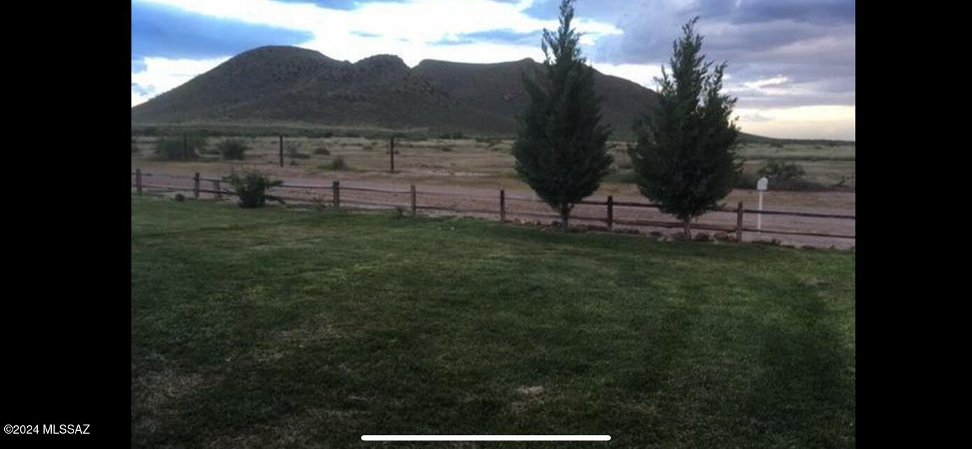 Rare Opportunity to own your own mountain - 855 Deeded Acres and the Three Sisters Buttes Ranch. Enjoy a 360 degree view of the Sulphur Springs Valley. Three wells on site include a 12'' well currently in use, 16'' well not currently used, a new 6'' domestic well which will include a well share agreement. Large corrals with metal shades, fenced and cross fenced with goat fencing and barbed wire fencing at 54'' high and new gates. Convenient paved frontage on Kansas Settlement Rd with natural gas located at multiple locations on the property. 
The house is newly remodeled with mini splits, new kitchen with granite countertops, new hardwood floors, spacious pantry, large laundry room and a metal roof. The front and back porched offer beautiful views, new landscaping for easy upkeep.