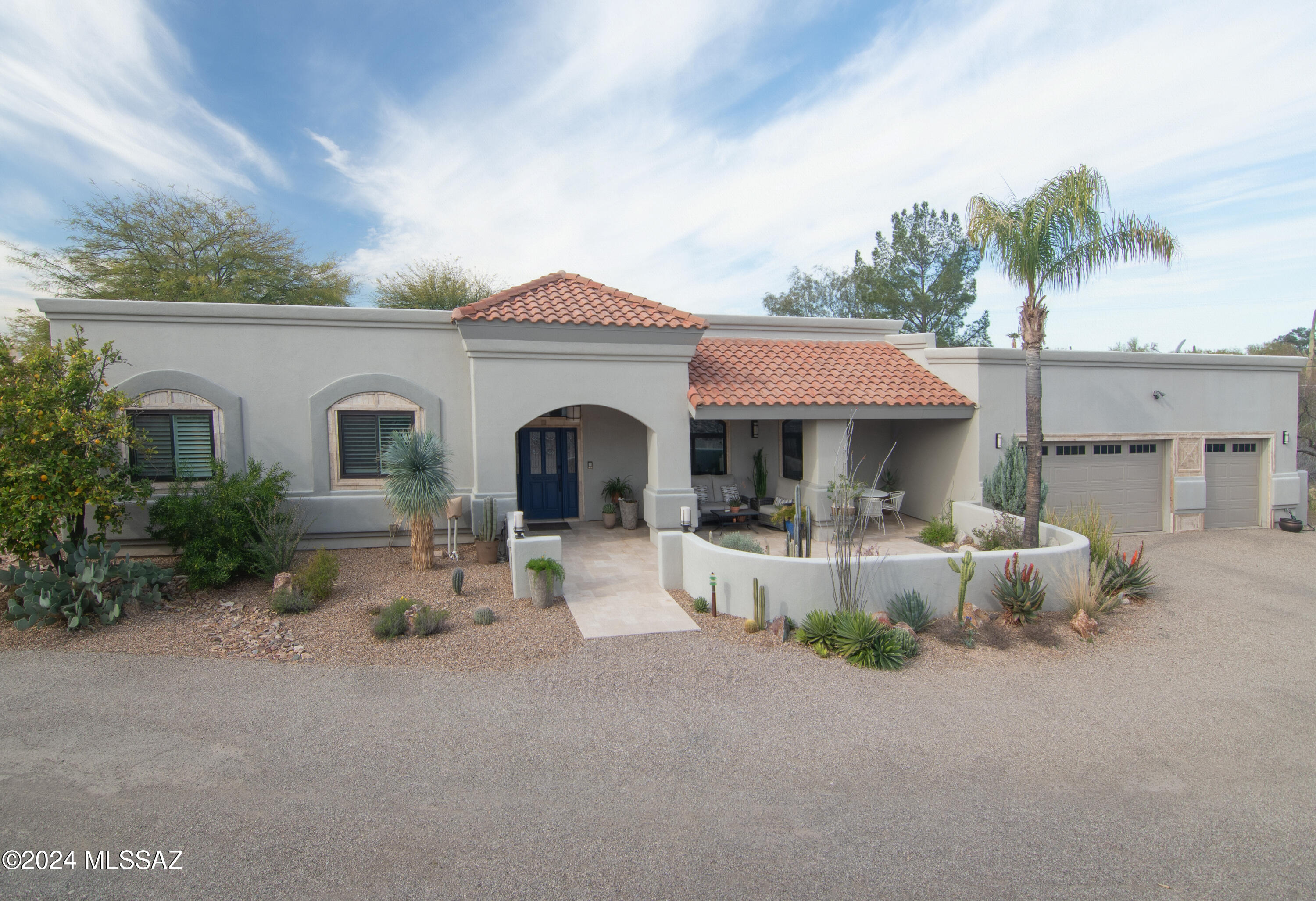 Glamorous 5 bed, 4 bath Mediterranean home on over an acre lot. Abundance of natural light. Close to Central Tucson, yet boasts a private bubble of mature citrus trees and lush landscaping for a peaceful recline at the end of your day. Adding to your enjoyment is the solar-heated pool, hot tub, and ample porch area. 850 gallon rain cistern for the environmentally-conscious. Garden shed/workshop area near the three-car garage. Inside are two primary suites, gorgeous granite kitchen with Wolfe gas cooktop, and updated bathrooms. Spacious laundry room with sink and lots of storage. Safe in second primary closet conveys. Postcard-worthy views of the mountains and city. An oasis of comfort and taste.

Assessor says 3,060 sqft, but 3,157 sqft from FloorPlansFirst.