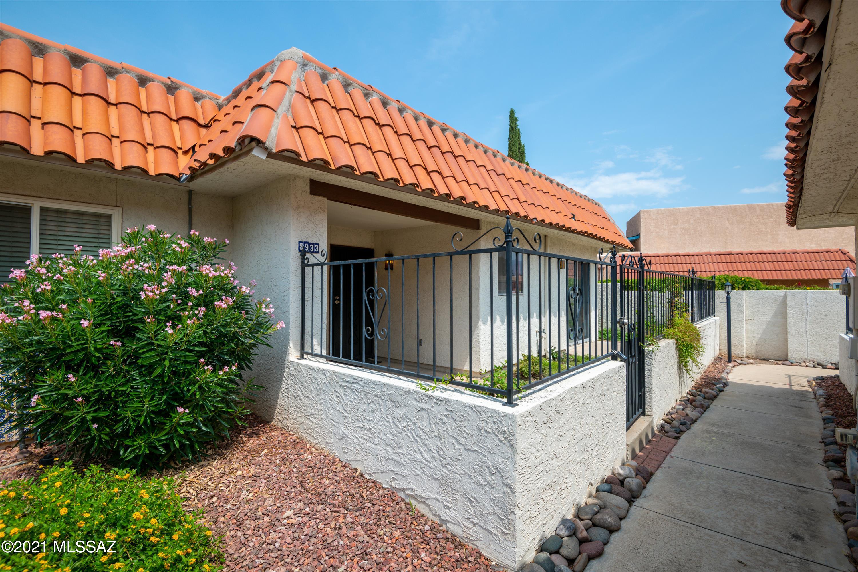Well maintained Centrally located Townhome in smaller and quiet community.
Fenced East facing garden Patio to drink your morning coffee. Enter home into Living room with decorative tiled flooring, accent walls and ceiling fan. Kitchen and dining area opens to patio. Kitchen has island with electric oven top. Unit has washer and dryer in closet next to kitchen. This home has 2 large Bedrooms that have access to additional patios. One patios has a storage closet and the other a portable storage unit. Both bdrms have walk in closets. Master bath has a walk-in tiled shower. 2nd bath has a tub. Community pool and spa a short distance away. Subdivision near hospitals, shopping and restaurants.