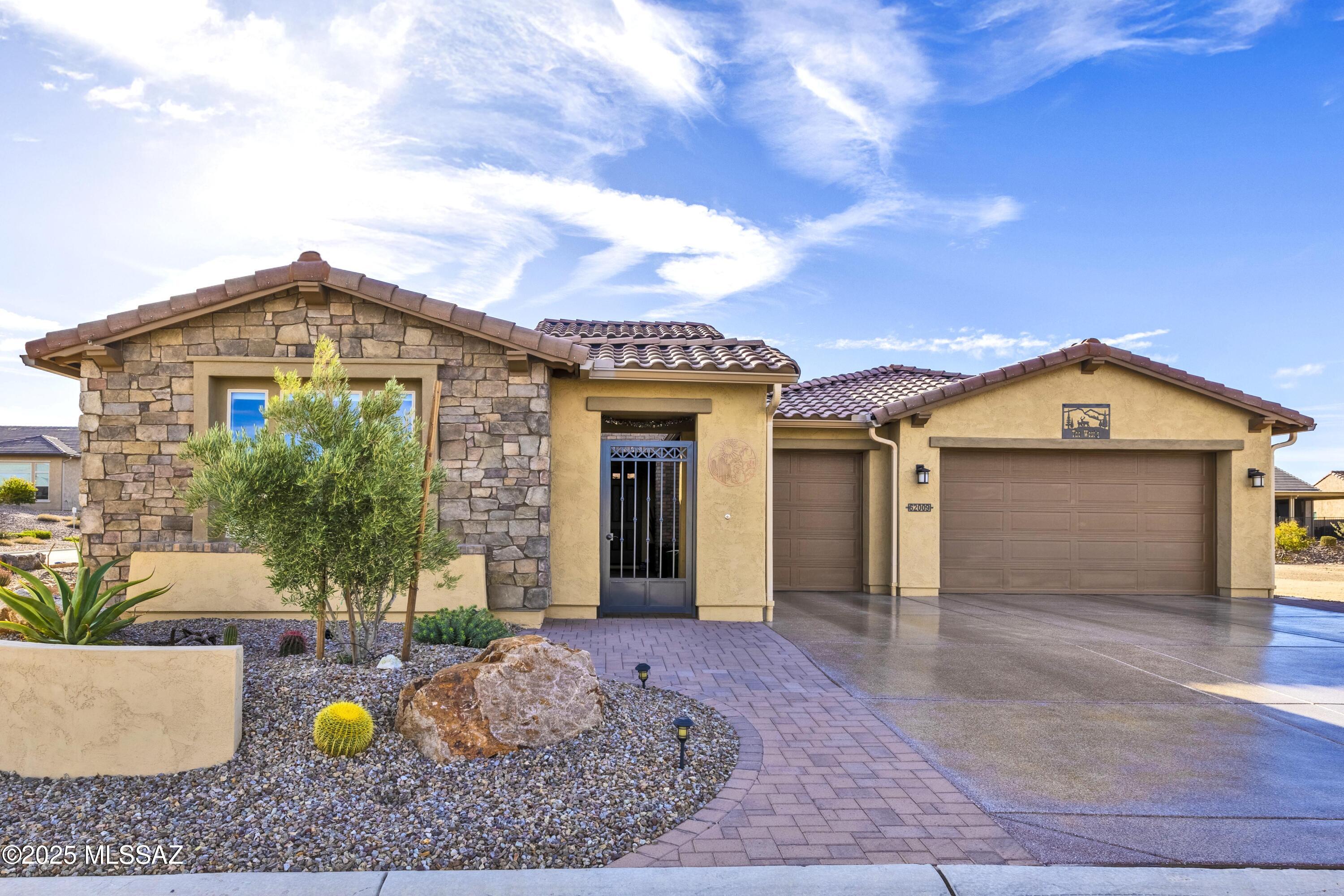 Welcome home to this stunning Vienta model with a detached Casita, nestled in the heart of SaddleBrooke Ranch. Thoughtfully designed with elegance and comfort in mind, this home boasts an inviting open floor plan adorned with designer touches, including upgraded cabinetry, ceramic tile flooring, stylish light fixtures, and ceiling fans throughout.
The chef's dream kitchen is a showstopper, featuring a spacious center island illuminated by custom pendant lights, quartz countertops, a designer backsplash, and upgraded GE Advantium black stainless-steel appliances, including a five-burner gas cooktop. Ample storage options, including a generous walk-in pantry, make this space as functional as it is beautiful. The great room flows effortlessly into the beautifully landscaped backyardperfect for entertaining or enjoying peaceful moments outdoors.
The detached, temperature-controlled Casita offers a private retreat for guests, complete with a walk-in closet, full bath, and additional storage.
The expansive primary suite is a luxurious escape, featuring a spa-like bath with a soaking tub, separate shower, and a large walk-in closet. A private guest suite with its own en-suite bath ensures comfort for visitors.
Additionally, the versatile den can serve as a home office, craft room, or cozy TV lounge.
This exceptional home offers the perfect blend of style, functionality, and resort-style living. Don't miss your opportunity to make it yours today!