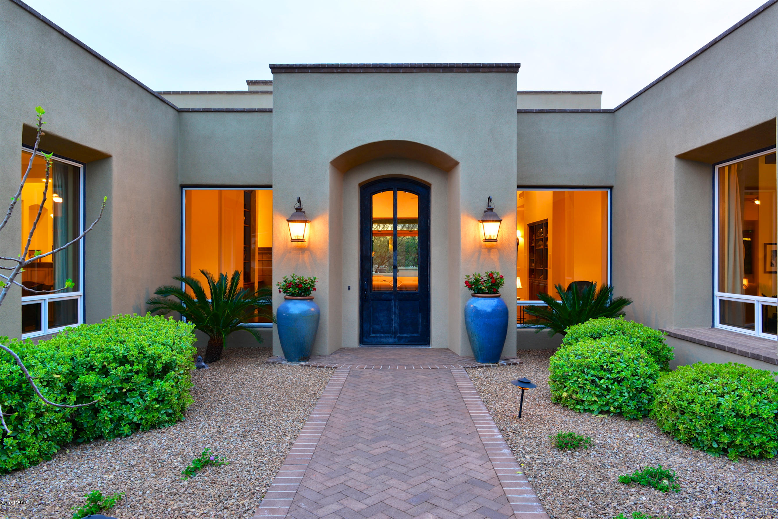 Incredible all masonry stucco home in gated Finisterra designed by renowned Southern Arizona Architect, Kevin B. Howard, & built by Eric Freedberg of Milestone Homes. This home features scored & stained concrete floors throughout, 5 bedrooms with all ensuite baths, master suite w/exercise room and over-sized study w/custom built-in cabinets. Amazing kitchen w/over-sized granite island features custom maple cabinets by SieMatic of Canada w/cappuccino finish,2 Sub-Zero refrigerators w/4 freezer drawers, Sub-Zero wine refrig, warming drawer, Dacor 6-burner dual fuel range,2 Bosch dishwashers, accented with 12' plank & beam ceiling. Pebble Tec pool/spa w/water feature,built-in BBQ and outside shower create a wonderful place to entertain family & friends. Both sellers are licensed agents in AZ.