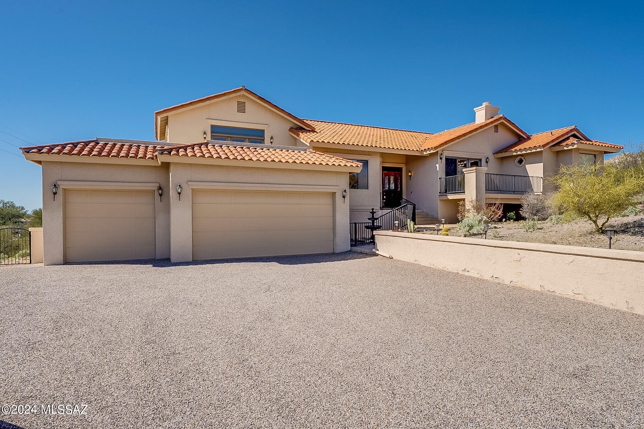 This elegant home in Cimarron Foothills Estates combines convenience with comfort, just minutes from Sabino Canyon's dining & shopping, & the Ventana golf community. There are stunning mountain views, with a cozy fireplace in the family room & an open-concept kitchen featuring a double oven—ideal for entertaining. The expansive great room includes a versatile loft space, perfect for a home office or additional living room. The home boasts two primary bedrooms, with the main suite offering a fireplace, private patio, and a spa-like bathroom with a soaker tub. A spacious bonus room with a separate entrance adds even more flexibility, perfect for guests or a private workspace. With a three-car garage for ample storage. Come check it out and make this dream home yours!