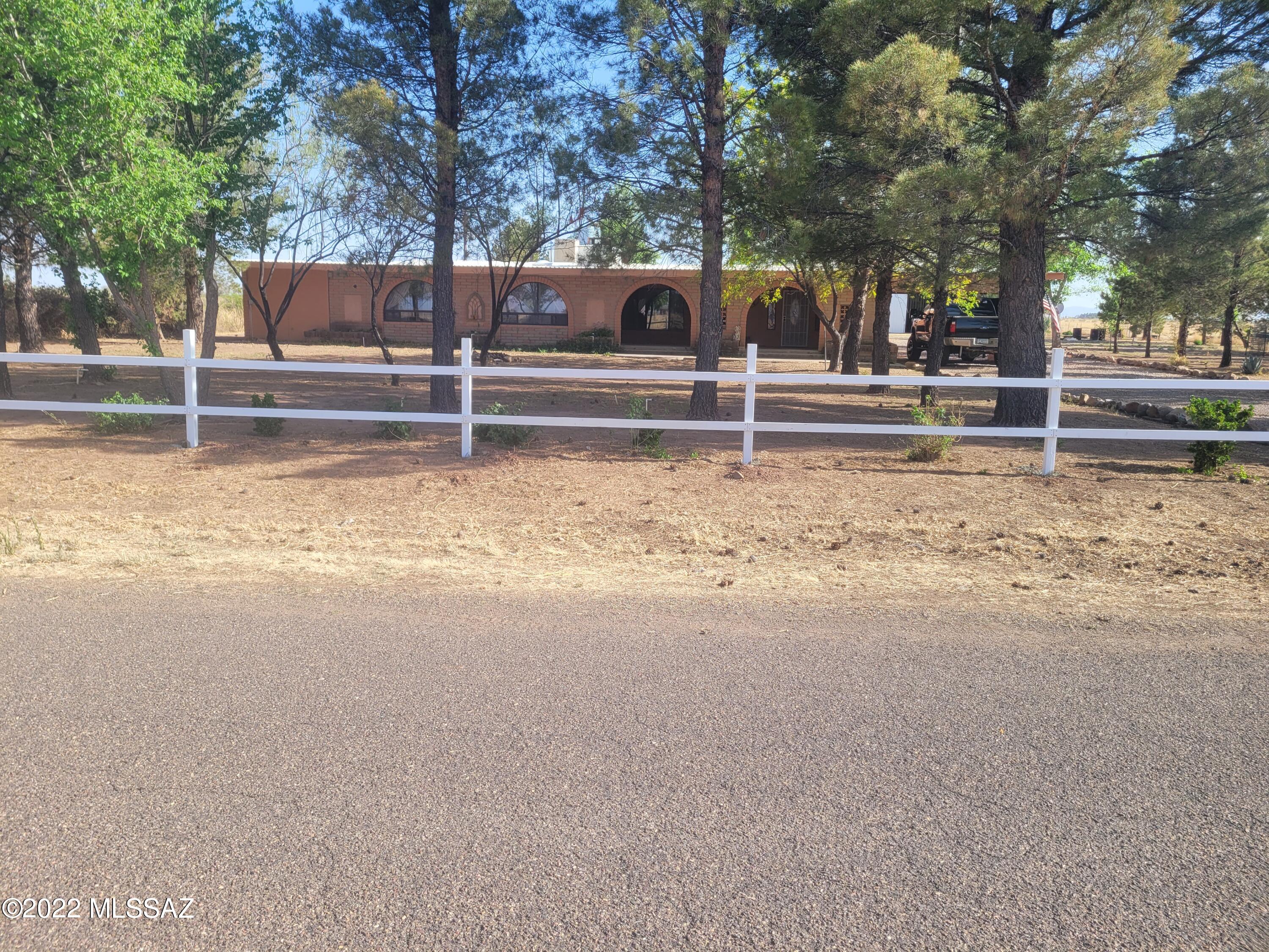 Here is your opportunity for a 3000 plus square foot well built home with an irrigation Well and over 42 acres and possible irrigation rights. A shop with over 1,700 square feet as well as a 1,200 square foot Quonset building for a machine shed or hay barn for a great horse property. Pens and plenty of pasture for your horses, cattle, goats, sheep, alpacas, or whatever you want to raise! Big shade trees all around the home to relax under and entertain guests. The workshop and Quonset building is ready for all your projects. The right size for a small farm to take all the produce to the Farmer's Market, have room for all of your 4H animals and abundant room in the house for a large or extended family! Use your imagination! Many possibilities for this great property on a paved road!