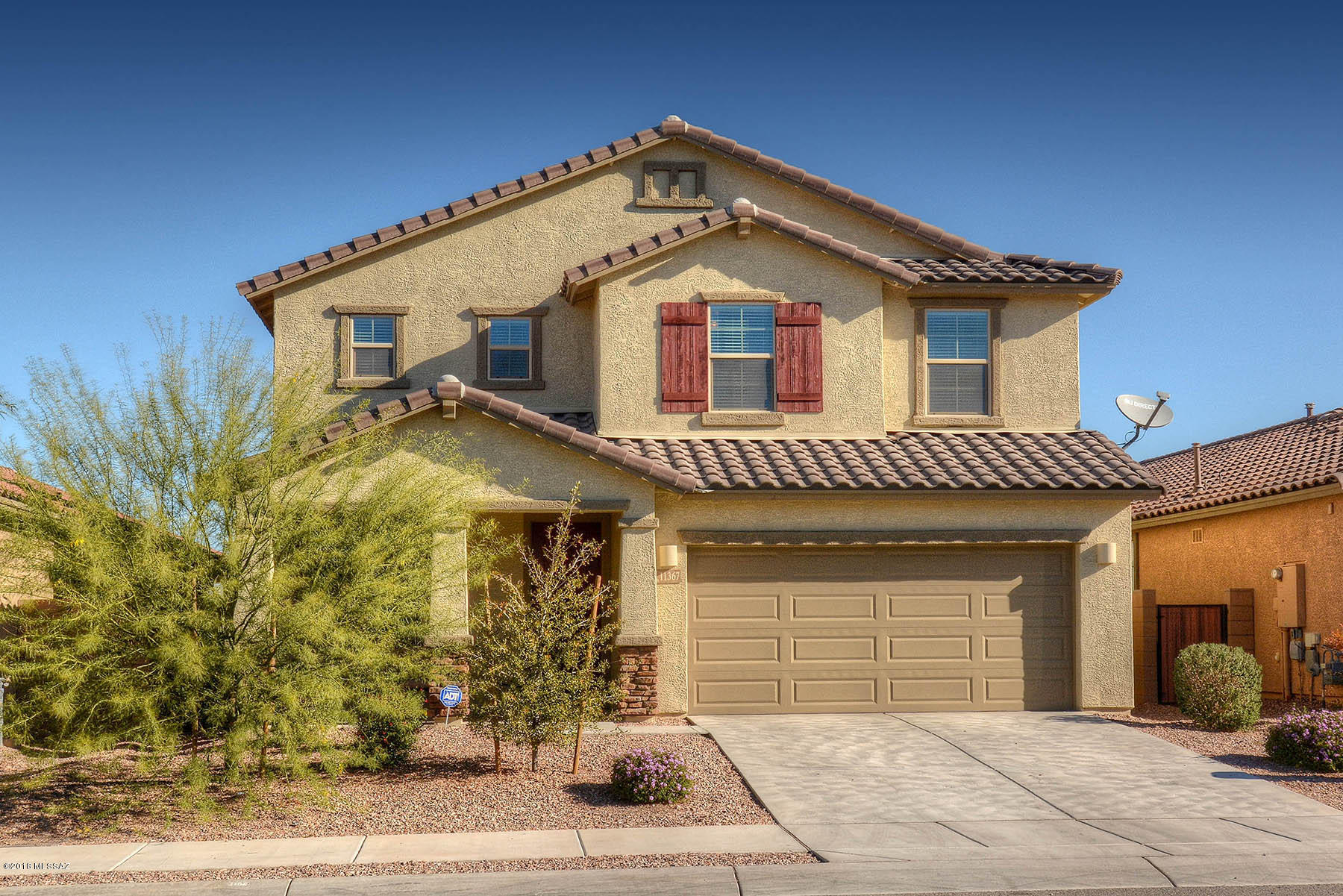 Gorgeous Lennar built 5brm, 3 bath home located in the Award Winning Vail School District. You will enjoy the spacious great room, living room & dining room. Fabulous upgrades like Granite Counters, 18'' Tile throughout, Luxury Carpet and Pad in bedrooms, 42'' Maple Cabinets with Crown Molding, Stainless Steel Appliances, and much more. Guest bedroom on first level with bath. Charming loft area with endless possibilities. The master retreat offers a generous walk-in closet, dual vanities, and oversized walk-in shower with bench. Large backyard with Premium Lot above neighbors behind! Great gathering place for family and friends. Close to everything, grocery store, retail, hospital, gyms. Esmond Station Regional Park will include baseball, soccer & softball fields, swimming & more.