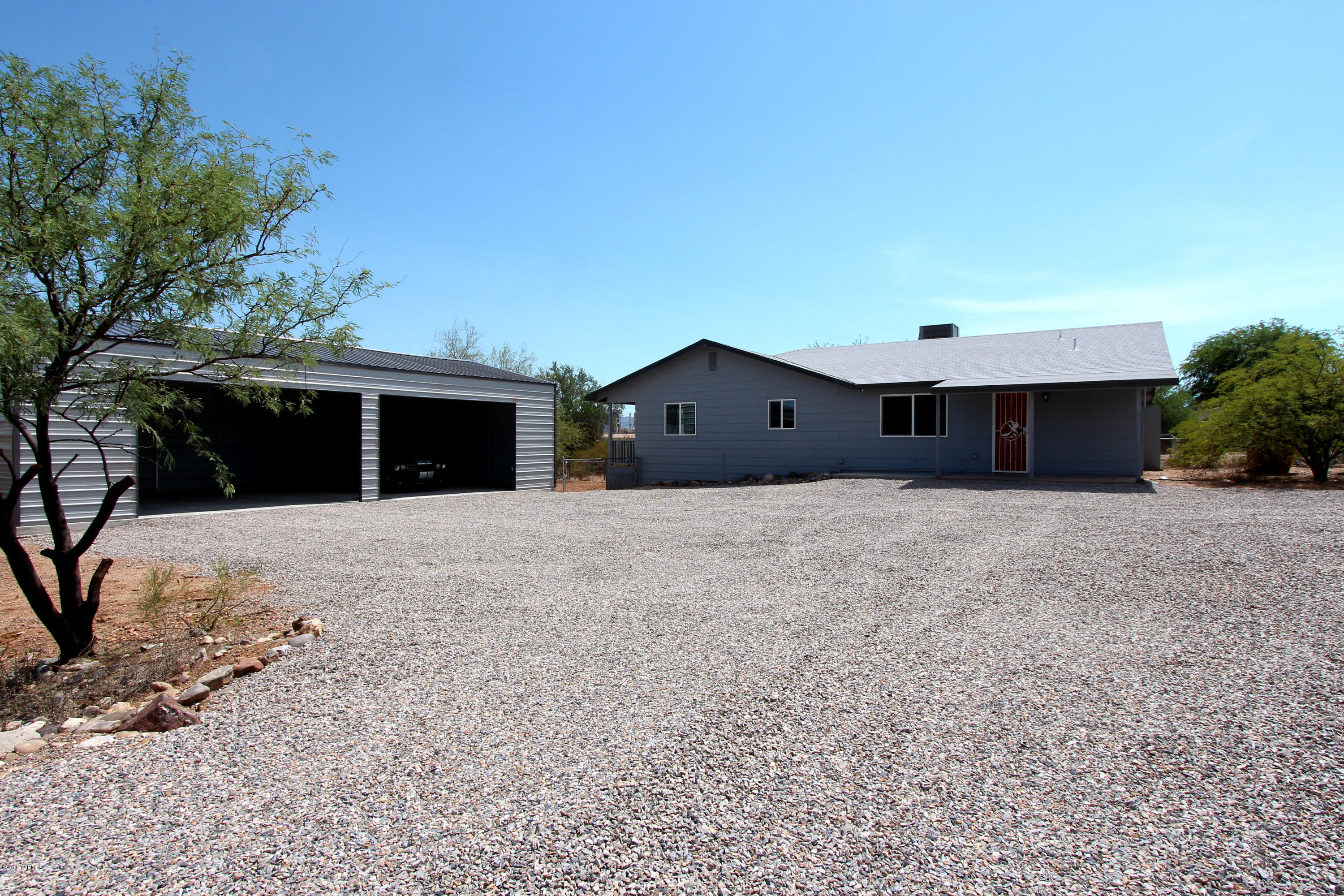 WoWzers!!!Great Scott!! Holy sweet house Batman!! Is what yo friends will say every time you invite them over to your house then it will be followed up with wow that is a really good price yo paid... 2000 sqft house 4 bed 3 bath 1000 sqft garage. 2 minutes from I-10 15 min from downtown.  All the country living with closeness of in town living.  These houses in Happy acres rarely come for sale, don't miss youur opportunity.