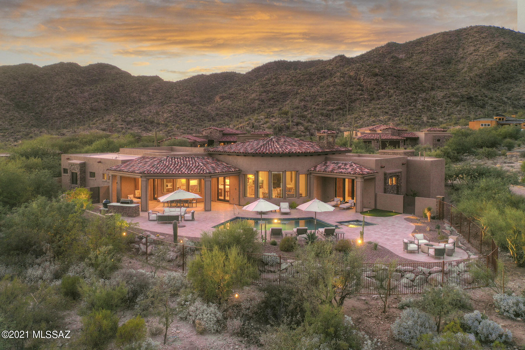 Remarkably Luxurious Home with Tranquil Outdoor Space! Nestled in the highly exclusive and private community of Stone Canyon Golf Club, this spacious 4BR/4BA, 4,333 sq. ft. executive residence has been meticulously designed to satisfy the most discerning style preferences. Richly fashioned with modern Santa Barbara architectural elements, the unique exterior captures your imagination with low-maintenance landscaping, a generous pave driveway, and a welcoming covered entryway. Encapsulating sheer beauty subtle glamour, the scintillating and sun-drenched interior features an organically flowing floor plan, high ceilings, a subtly warm color scheme, and an expansive great room with intoxicating mountain views and a push-button television bracket for an exceptional viewing experience. Be inspired in the gourmet open-concept kitchen featuring top-of-the-line stainless-steel appliances, a Wolf gas range with a pot filler, quartz countertops, a Sub-Zero refrigerator, custom cabinetry, a center island with waterfall edges, an upscale backsplash, a 102 bottle wine cooler, and a lovely breakfast nook. Fashioned for those who entertain with exacting standards, the fully enclosed backyard includes a swimming pool, a soothing spa, Travertine pool decking, a covered patio with sunshades for enclosure, an outdoor kitchen, a firepit, and Zen-like hardscaping. Pure bliss is realized in the oversized primary suite with tray ceilings, a deep walk-in closet, and a completely luxe en suite featuring a free-standing soaking tub, a separate shower, double vanities, and premium finishes. Three additional bedrooms are abundantly sized for guests, children, or home offices. Other features: attached 3-car garage with epoxy flooring and built-in cabinetry, laundry room, an office, control 4 audio video system, remote controlled sun shades (60K), Shaw fire clay sinks.  Please call for a tour of the Stone Canyon Club amenities.  Stone Canyon is a private golf course development continuously ranked in the top 100 Private Clubs in the Country.  Membership Requirement with purchase of Real Estate.
