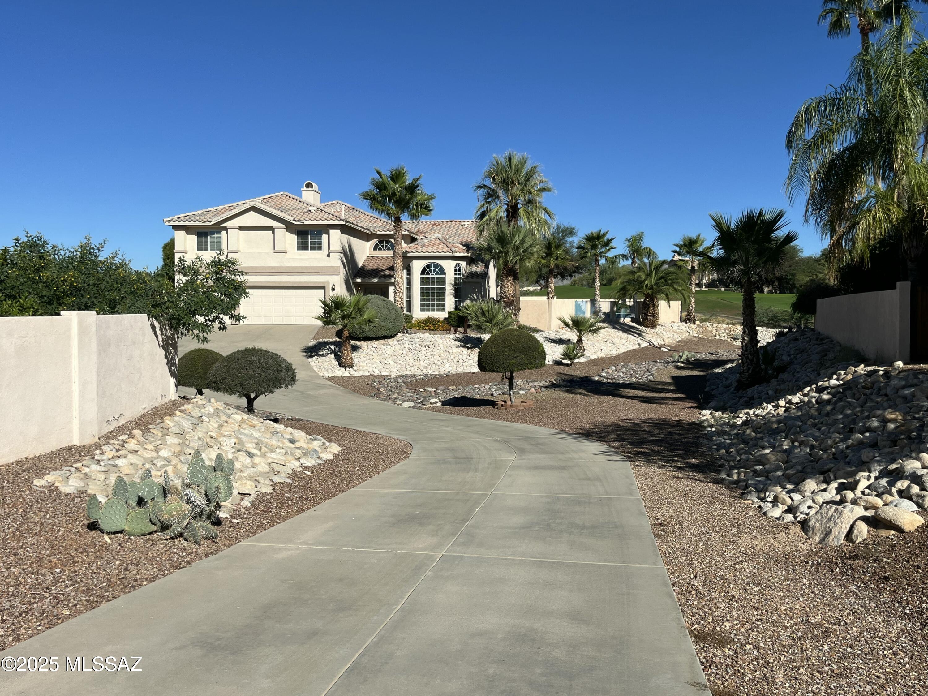 I can't begin to say enough about this home. So I'll let the owners tell you about their home in their own words.  The Cañada Hills neighborhood offers an exceptional community experience. We are long time residents and have enjoyed the very unique benefits of this home and the town of Oro Valley. You will enjoy the privacy of a large and well positioned lot at the back end of a cul de sac, which backs up to the 11th hole on the Conquistador Golf Course.

A total of five large bedrooms are well arranged and offer ample closet space. Private his/hers closets, along with a garden tub, are found in the master bathroom. The living spaces are large and newly upgraded. The views are some of the best in the neighborhood. We have tales of wildlife found in Oro Valley and this neighborhood such as hawks, owls, falcons, bats, javelina and coyotes.

What could make this home better for a future family? Let's share the joys of a large sparkling pool, family sized spa, half-basketball court, newly installed artificial turf, and much more outdoor leisure space. The long driveway accommodates many vehicles, something very unique for this neighborhood. 

Nothing has been ignored or deferred in caring for this home. New owners will appreciate a brand new roof, along with delightfully new exterior paint, all done in 2025. Additionally, both HVAC units are newly purchased within the last five years. The landscaping is varied and provides for privacy. The surrounding mountains are visible on all sides. The best part: the beautiful sunrises and sunsets, along with the star-filled night sky. Every day is fresh and spectacular!