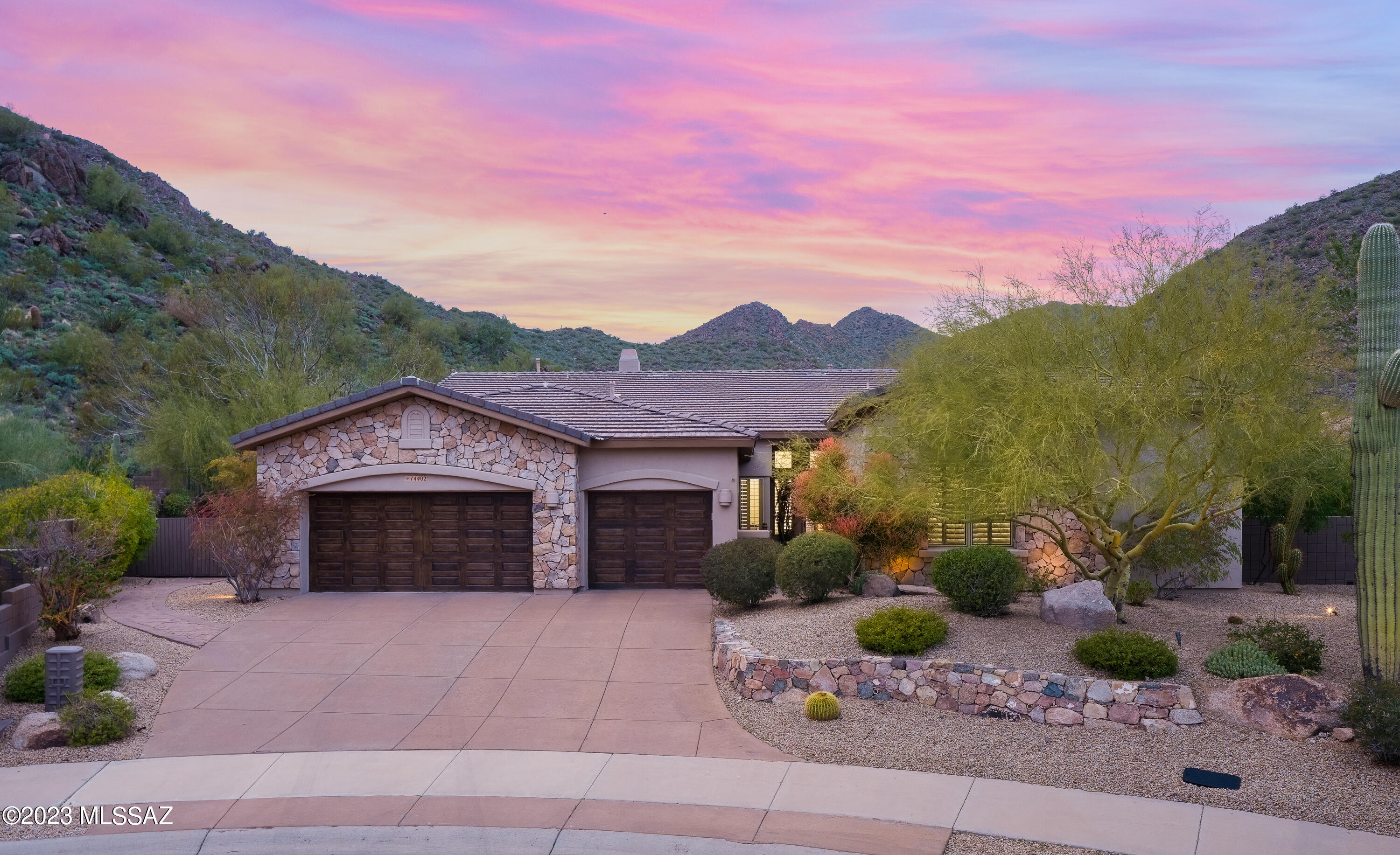 One of the largest lots in the gated community of Hidden Hills is now available. Nestled at the base of the McDowell Mountain Preserve. View fence makes the mountains feel like it's an extension of the property. This tranquil retreat boasts many custom features & landscape designs. Pebble Tec heated pool, custom sunken firepit, large covered patio w electric awning, builtin BBQ, putting green, river flows into Koi pound, large mature trees & a rose garden. Primary bedroom has french doors to the patio, large walk-in closet, spacious bath w his & her vanities. Kitchen/great room offers builtin seating, eat up bar at the island, gas range, dual ovens, granite countertops, with pull out in the cabinets. Interior upgrades include Pella windows with integrated shades, bedrooms w solid wood shut