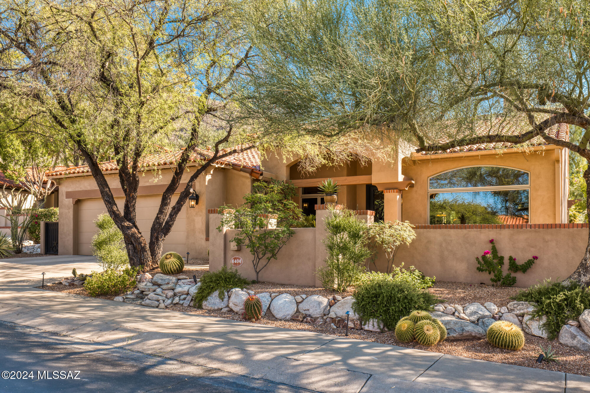 The ''Cream of The Crop'' - Totally Updated 3BR & 3BA + Office Golf Course Home in Gated  Ventana Canyon. One Level 2,900 SqFt Masonry Constructed Home on The 2nd Fairway of the VC Mountain Course.  2022 Updates Include: All New Windows - New Kitchen w/ Custom Cabinetry & Sub-Zero + Thermador SS Appliances - New Office Cabinetry - New Primary Bath, w/Steam Shower - New Lighting -  Interior+Exterior Painting - Two New HVAC's - New Tankless Water Heater & Water Filtration - Epoxy Floors in Climate Controlled Garage. Other Fine Features Include: Tumbled Travertine Floors & High Ceilings Throughout - Covered Patio w/ Auto Shade Screens & Grill - Sparkling Pool & Spa - Lush Vegetation - Golf Course & Mountain Views. Close to Golf,Tennis,Swimming,Dining & More at the Ventana Canyon Country Club.