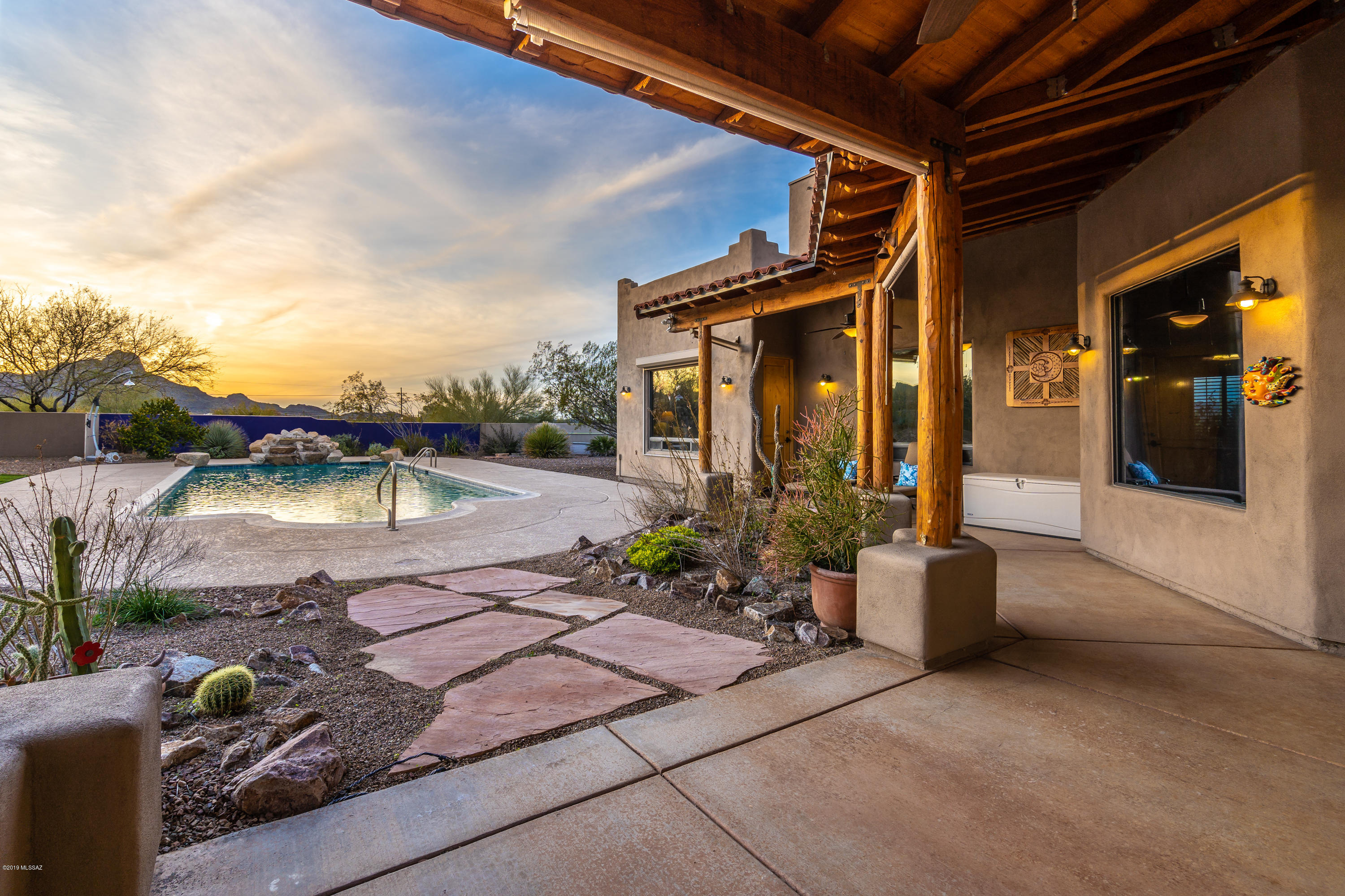 This extraordinary home is perfectly situated on 3.3 acres of peaceful and serene natural desert and landscaped pathways to capture breathtaking 360-degree views of the Catalinas, Tucson and Tortolita mountains. 

Perfect for entertaining, this open floor plan is wonderfully enhanced with spacious 14' ceilings and tongue & groove viga beams. The stained concrete floors add to the charm and warmth of this wonderful home featuring 4 bedrooms, 3 bathrooms, an office and separate guest house.

The private and spacious master suite is the perfect retreat and offers a jacuzzi tub and large walk in closet.

Beautifully designed gourmet kitchen with granite and Dekton counter tops, high end appliances including Wolf Cooktop and large island are sure to please the chef in you.  Welcome home!