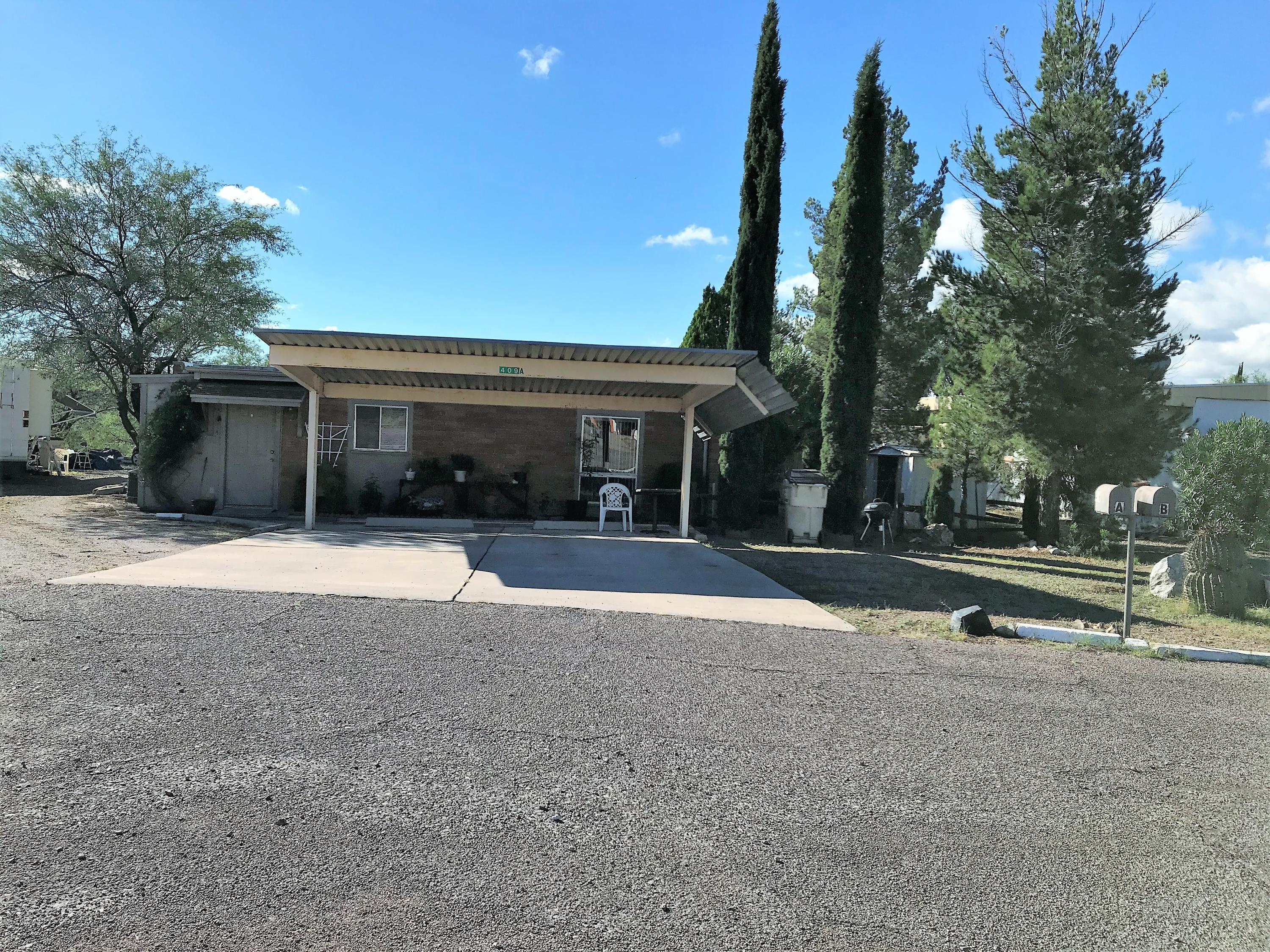 A very nice, well maintained DUPLEX in the  heart of Rio Rico.... Each unit is almost 1,000 sq. feet... has private patio area, covered parking, A/C, ceramic tile flooring, appliances ~~ close to schools, churches, fitness center, golf course and walking path !!! ~~
A great investment property !!!