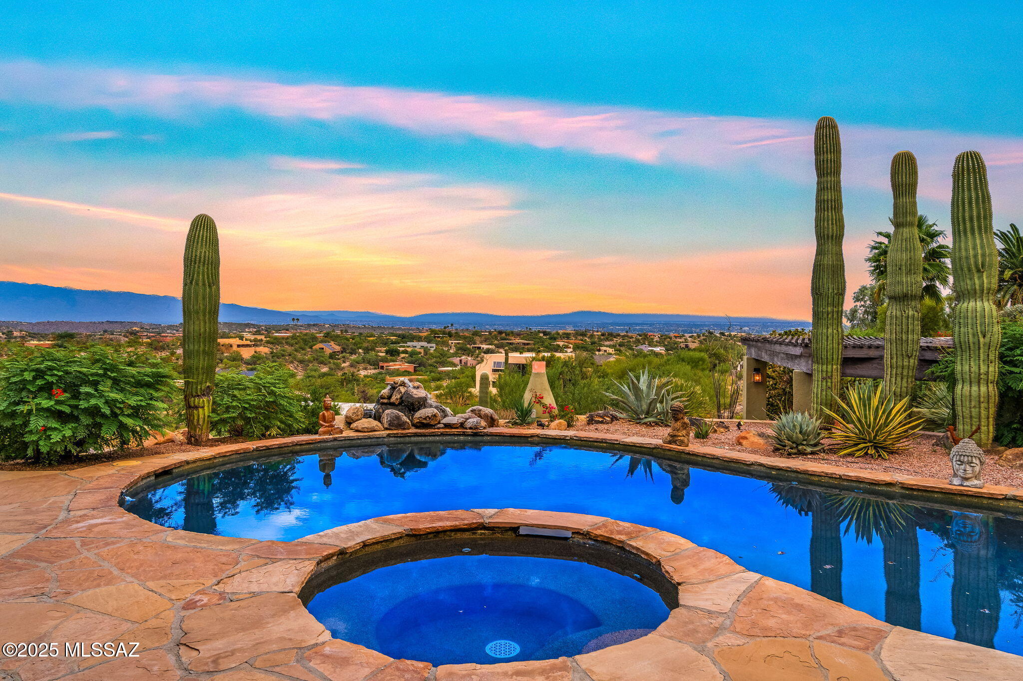 Unbeatable views! Perched high on one of the best view lots in Alta Vista, and at the end of a quiet cul-de-sac, this Catalina Foothills home epitomizes luxury and modern sophistication. Meticulously reimagined with over $250,000 in high-end upgrades, this home seamlessly blends timeless elegance with contemporary functionality, offering an unparalleled lifestyle in the heart of the Sonoran Desert. This single-story residence encompasses 3,552, sq ft, with 4 bedrooms, 3 full bathroom, and a spacious 3 car garage. Step inside to discover new walnut wood-look porcelain tile flooring that flows gracefully throughout, creating a warm yet refined ambiance. The heart of the home, a bright and pristine kitchen, boasts custom cabinetry, sleek quartz countertops, newer stainless appliances, including a gas stove powered by a newly installed gas lineperfect for the discerning home chef. All three bathrooms have been transformed into spa-like retreats, featuring new cabinetry, pebble-floored showers, premium plumbing fixtures, modern toilets and sinks, and a sumptuous soaking tub in the primary suite for ultimate relaxation.  Freshly  painted inside and out with premium Dunn-Edwards paint, the home radiates a polished, cohesive aesthetic. Enhanced by all-new designer brass door hardware, updated interior and exterior lighting fixtures, and new skylights, every corner is bathed in sophistication and natural light. The residence is equipped with cutting-edge technology, including an enterprise-quality wired and wireless Wi-Fi network, a state-of-the-art security system, and updated garage door openers for seamless connectivity and peace of mind.  Climate control is effortless with two new AC units, a new water heater, and a recently coated roof with a warranty, ensuring year-round comfort and durability. The updated laundry room, complete with new cabinetry and countertops, adds practicality to elegance, while a California Closet bookshelf system in one bedroom/office elevates functionality with bespoke craftsmanship.  Outside, the property is a desert masterpiece, with extensive landscaping showcasing specimen trees and iconic cacti, complemented by an updated irrigation system for effortless maintenance. Additional upgrades, including comprehensive electrical and plumbing enhancements, ensure this home is as reliable as it is luxurious. This extraordinary residence is more than a homeit's a lifestyle, offering the perfect blend of modern luxury and desert serenity.