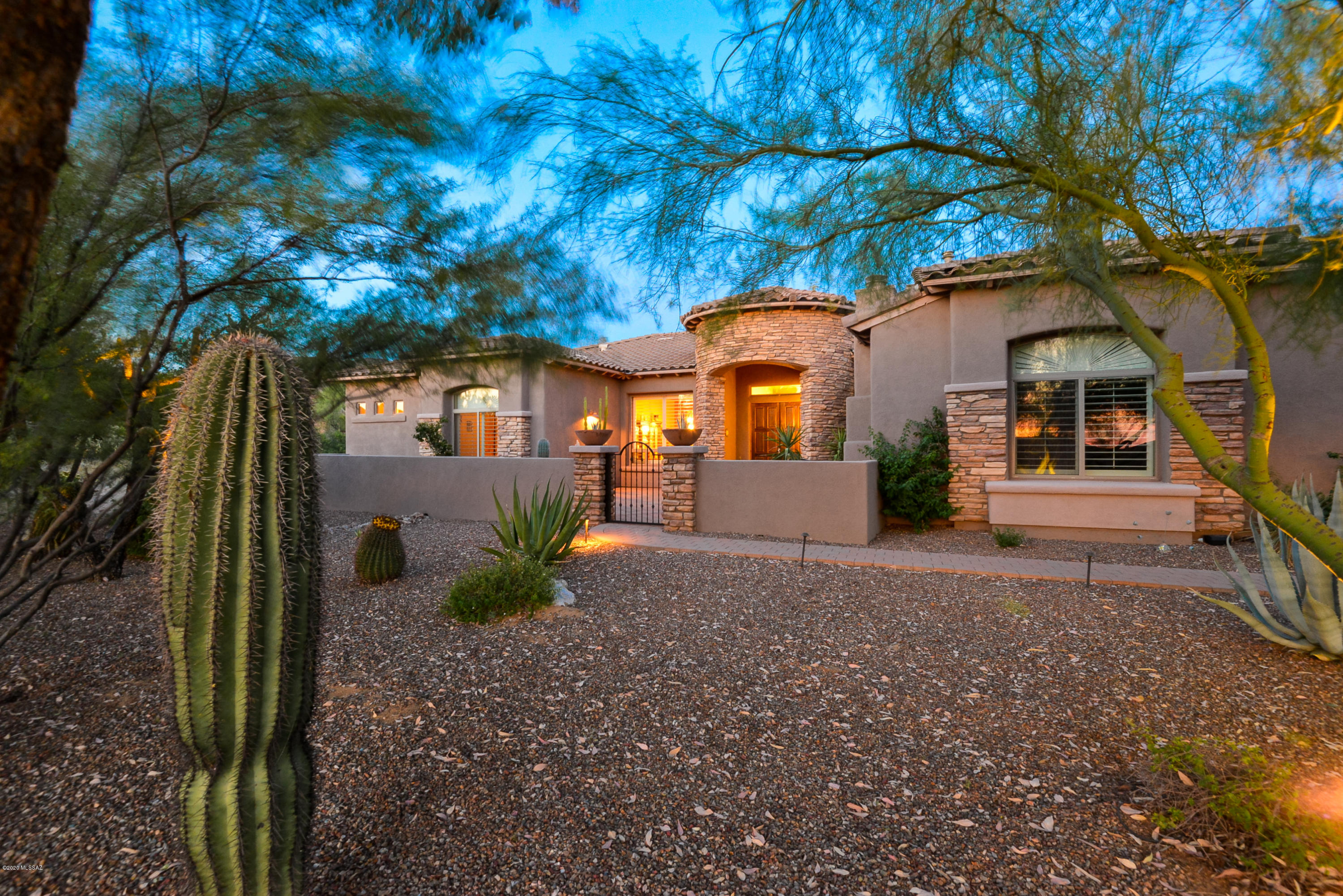 Stunning home located in desirable gated Dos Lagos on .66 of an acre. Enter through gated front courtyard with pavers and fireplace and an even more stunning backyard. Enter through double Alder doors into beautiful open floor plan.  Kitchen boasts SS appliances, maple cabinets, granite counters, island & 2 pantries. This split plan includes  spacious master on one side w/jetted tub & walk-in shower w/2 walk-in closets and travertine flooring. . Split bedroom plan with 2 bedrooms w/their own  full baths, office and 1/2 BA.  Travertine flooring throughout, carpet in secondary bdrms  & office.. Plantation shutters & alder doors thruout. Bkyd features a paver patio, sparkling pebble tec pool and raised spa, built-in BBQ,, fire bowl, & fire pit with seating. An exquisite home not to be missed