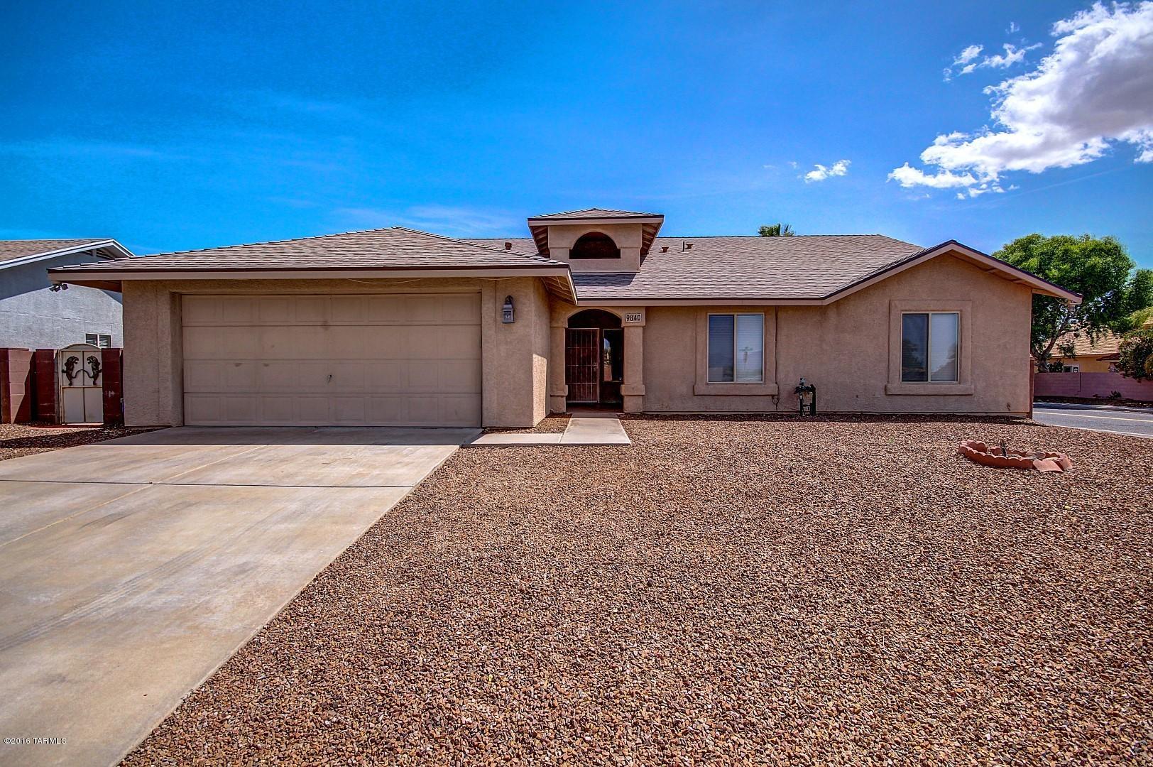 Gorgeous 4 bedroom 2 bath home in family friendly Rita Ranch. Home sits on a corner lot with an Open and bright floor plan. Featuring 18'' tiles, fresh paint, high ceilings, and large living space. New roof as of February. The backyard has artificial turf and fenced in yard. Perfect for a play area or entertaining. Near to shopping, retail, restaurants and 1-10. Come take a look.