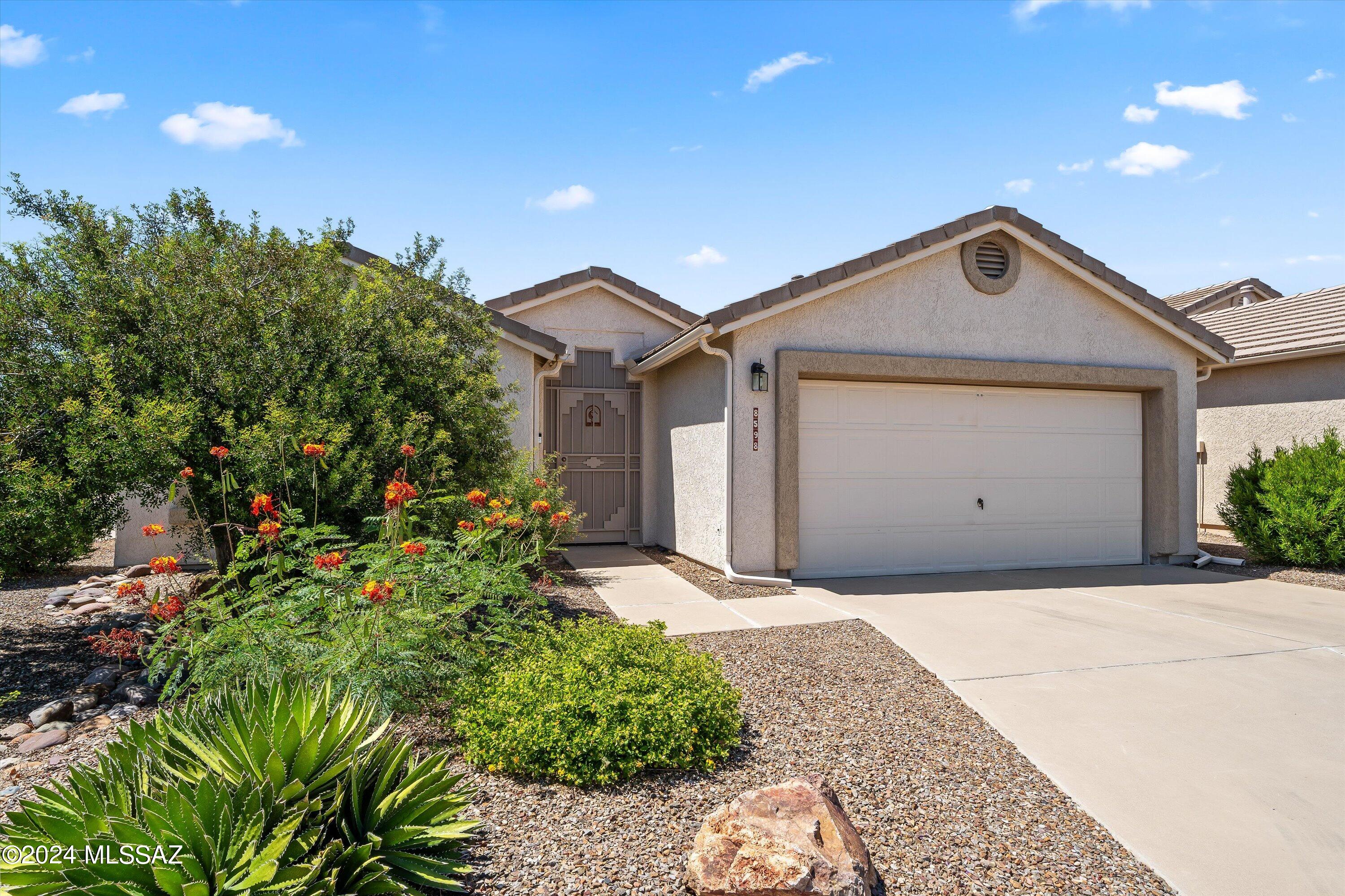 Welcome to this larger corner lot that offers an unparalleled lifestyle with its prime location directly across from the sparkling community pool, walking distance to the many activities the Cove has to offer AND Furnished! As you step inside, you're greeted by a spacious living area that opens up to the kitchen (w/gas stove), all lower and pantry pullouts and dining room, creating an inviting ambiance for both relaxation and entertainment. The primary is well sized adorned with an ensuite and walk-in closet, providing ample storage space.  From the dining or living space exit either of the large patio sliders to the patio that features an electronic retractable shade, peaceful backyard w/ mature trees and easy care turf.  New roof  2022.  Welcome Home!