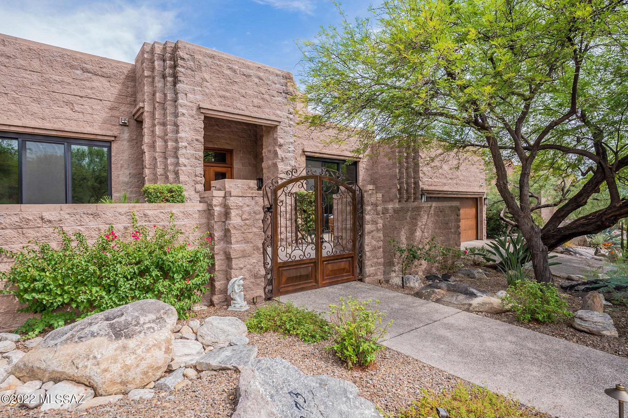 Easy, Luxury Living, In This REMODELED, Move in Ready, 5 BR & 4 BA+Office Ventana Canyon Gem. This Well Built, All Masonry ''Ventana Block'' Home is Located on a Private Golf Course Lot. Updates Include NEW Windows & Doors, Kitchen, Bathrooms, 72''  Mezzo Fireplace, Carpet, Paint, Baseboards, Lighting, Security System, Exterior Spiral Staircase, & Roof Restoration System w/ 10-Year Warranty. Other Fine Features Include: Courtyard Entry, First Floor Primary Suite, 2 Upstairs BR's & BA w/Private Balcony + Mountain & Golf Course Views, Dining Rm w/Patio and Double Wine Refrigerator, High Ceilings, Walls of Windows, 24x24 Travertine Floors, Solid Maple Doors+Cabinets, Two Car Garage + Golf Cart Garage, Backyard w/ Walkways & Patios, Stone Fireplace, Outdoor Dining Area...& NO POOL TO DEAL WITH