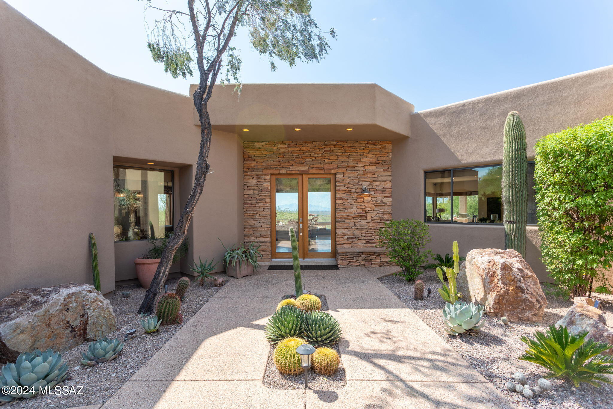 This is a stunning property! Gorgeous city views! Majestic mountain views from the viewing deck. 3 bed, 3 bath. Gourmet kitchen, high ceilings with a wall of windows to the city. Steam shower and office areas within the master. This home is perfect! Call Stephanie to view. 520-577-5120