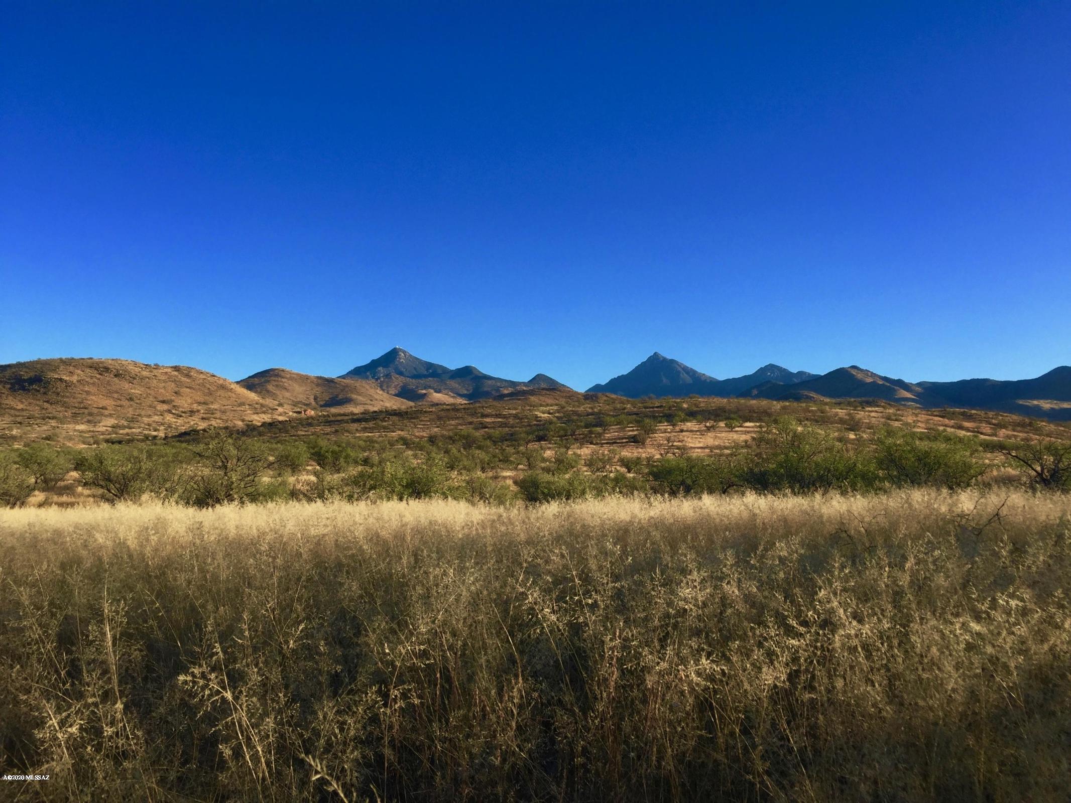Pick an elevated building site on this 37 ac parcel and enjoy the surrounding beautiful views of the Santa Rita Mtns, easy access to Coronado Nat'l Forest and the beauty of Bond Canyon! This gated community affords you privacy yet convenience to Tubac and surrounding areas! This exclusive gated community of 36+ acre homesites is situated east of Tubac next to Morning Star Ranch. Surrounded by the lush foothills of the Santa Rita Mountains to the north and the Grosvenor Hills to the south, you'll find spectacular estate homes and an emphasis on the region's best-preserved natural beauties, adjoining hundreds of acres of State Trust Wilderness Lands. Water supplied by privately owned wells.
