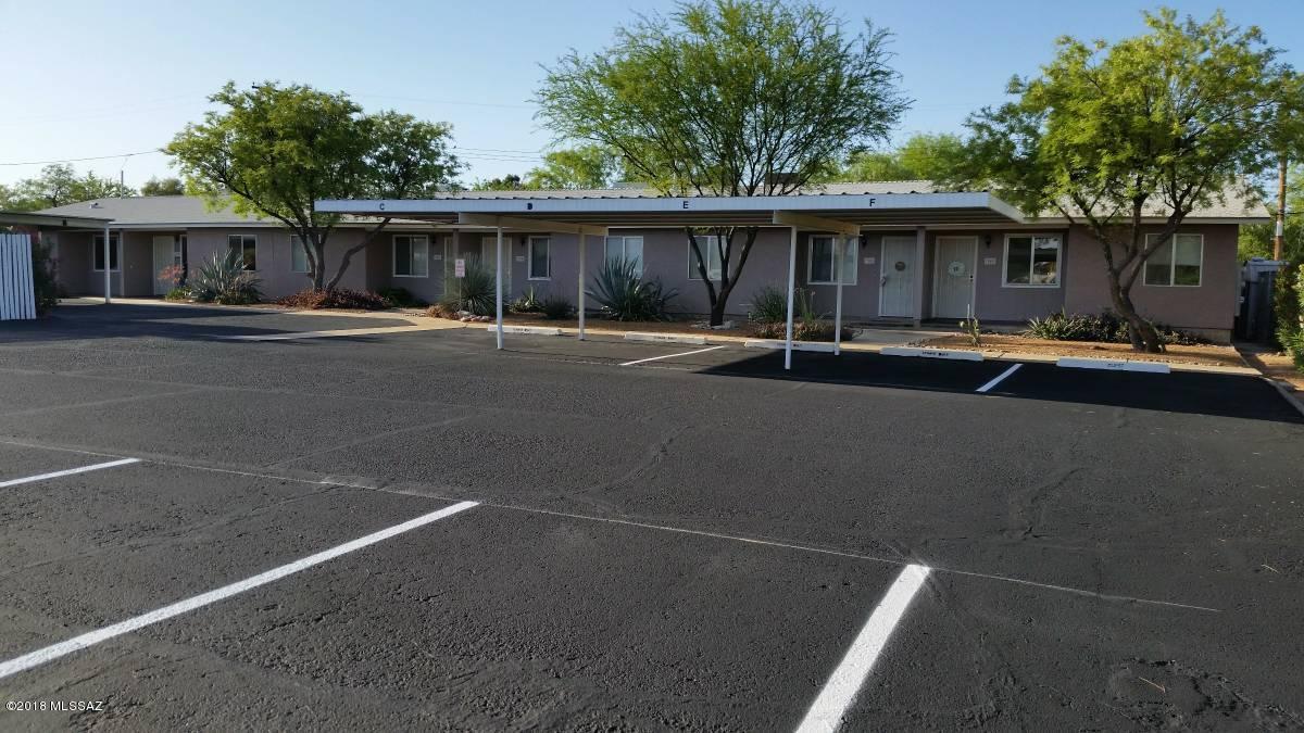 **Seller carry-back required with 25% down, 5.75% interest rate, 30 year amortization and 5 - 7 year stop**.
 Rare 1985 and 1995 construction, Calle Arizona Residences comprise a quality 8-unit complex offering tenants city living in a quiet setting within walking distance of Tucson Mall, LA Fitness, Sprouts Market, WalMart and a great variety of Oracle Road stores and 4 bus lines.
The six desirable 2-BEDROOM / 1-BATH SINGLE-STORY TOWNHOMES (775-sq.ft. each) feature very functional floor plans, ceiling fans and finished concrete floors throughout, as well as central A/C and a large backyard (23' wide by 25' long) with private enclosed laundry area (including washer and dryer). Each residence has one covered parking space, with ample additional parking. The 1600-sq.ft. 3-BEDROOM / 2-BATH HOME features central A/C, tile floors (except bedrooms), open kitchen / dining / living area, large storageand laundry room with washer and dryer, a large fenced front yard, two parking spaces (one covered).
In the 900-sq.ft. attached 2-BEDROOM / 2-BATH DUPLEX UNIT, each bedroom has its own bathroom. It offers finished concrete floors throughout, skylights in each bathroom, plus stackable washer / dryer unit. Built in late 2004, this highly energy-efficient residence also offers central A/C, two parking spaces (one covered), a fenced yard (32' X 12').
There's even SPACE FOR A POSSIBLE 9TH UNIT behind the duplex. 
Leases are long term with stable renters.
Seller will consider a carry-back	
For video and pics, see http://www.FNSInvestments.com