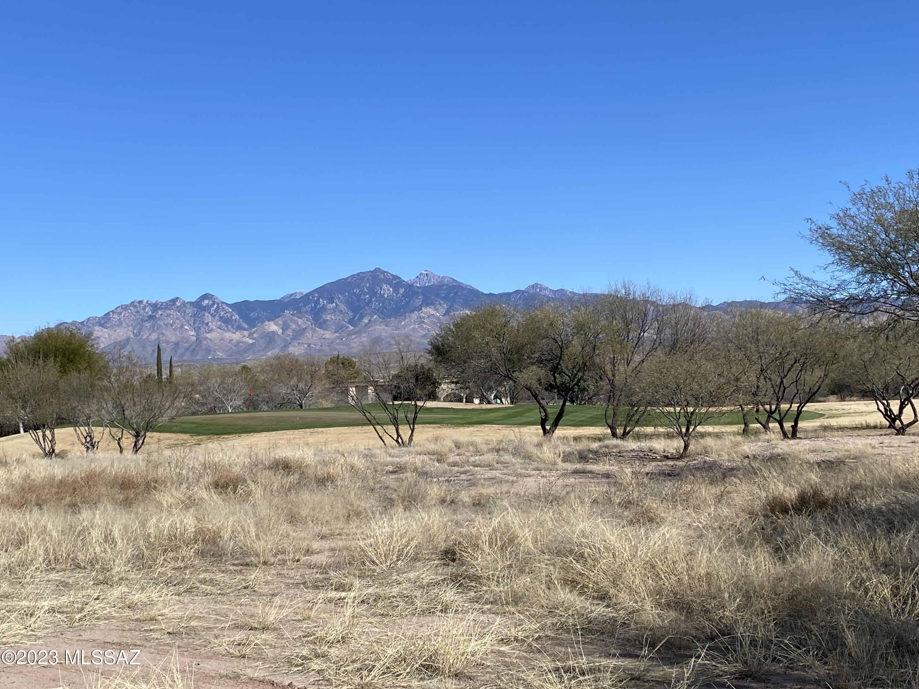 Best Mountain Views in Tubac! Tubac Golf Resort (approximately 1/2 acre) lot on the green of Hole #3 of the Anza Golf Course with panoramic views of the Santa Rita Mountain Range. Paved streets and utilities (Epcor water, sewer, electric, natural gas, phone) to lot line. Ready for your custom-built home with the builder of your choice.