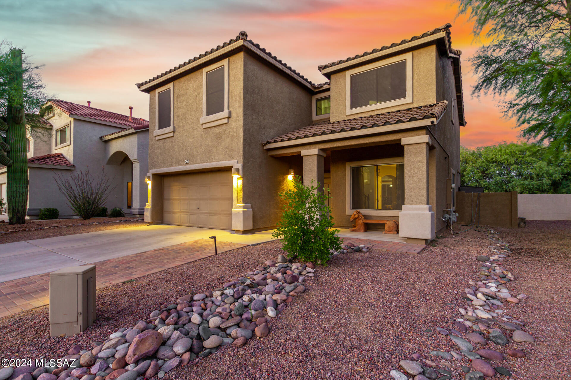 This sounds like a dream indeed! The blend of comfort and community amenities makes it an ideal living space for various lifestyles. The interior design, with its spacious layout and practical features like the downstairs laundry room, adds to the convenience of daily life. And the emphasis on privacy with all bedrooms upstairs, especially the primary suite, is a thoughtful touch.
The outdoor space is like a retreat, perfect for both entertaining and relaxation. The extended covered porch and mature landscaping create a serene atmosphere, and the lack of rear neighbors adds to the peaceful ambiance.
Rancho Sahuarita offers activities for residents of all ages. This is a wonderful place to call home, where comfort, convenience, and community converge. Welcome Home