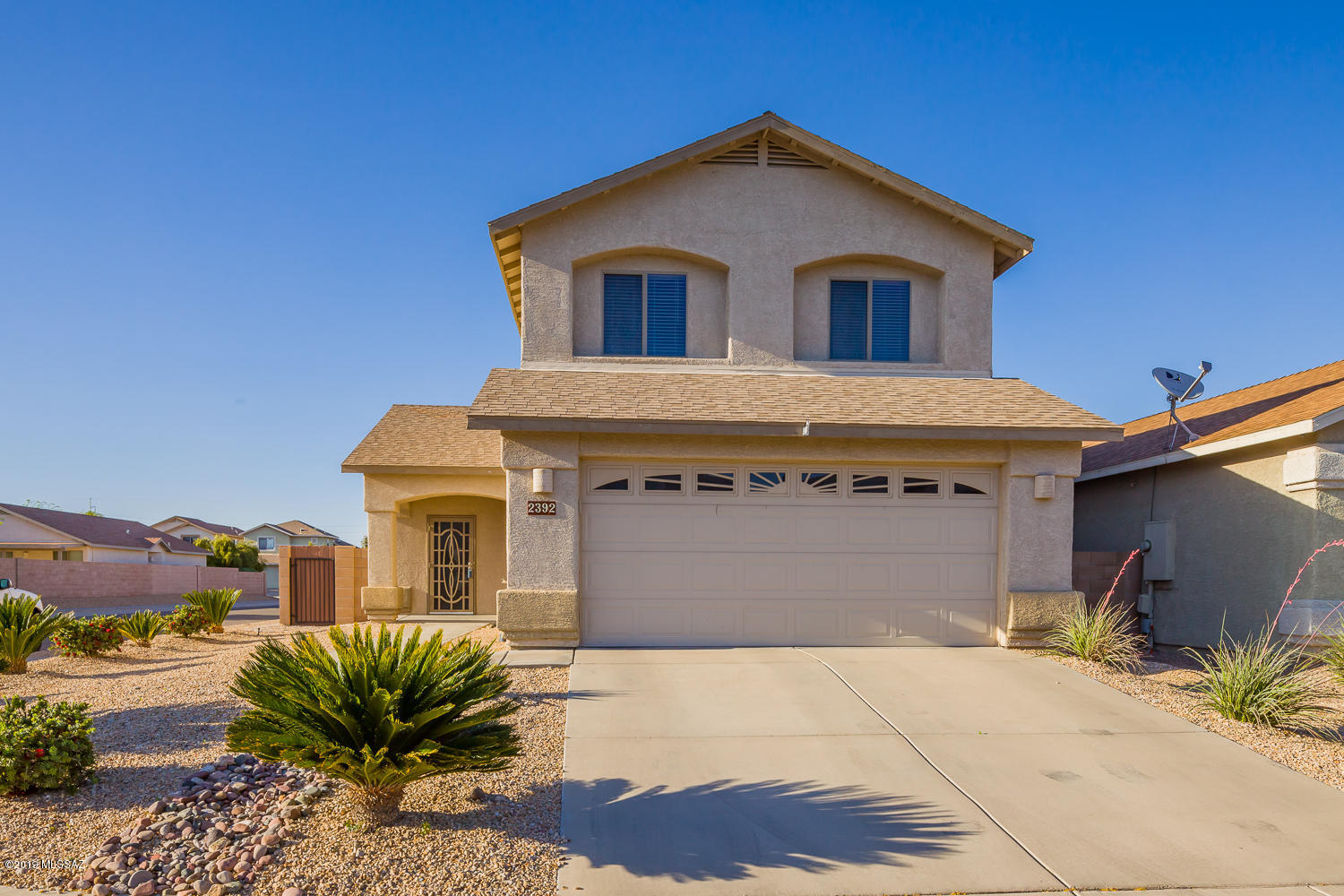 Move in ready house in a super convenient location! Ceramic tile everywhere down stairs, upgraded carpet upstairs, stainless steel appliances, refrigerator, washer & dryer stay, large artificial turf area in the back yard, tons of shade, balcony off the master bedroom, mountain views & so much more. Make this home yours today!