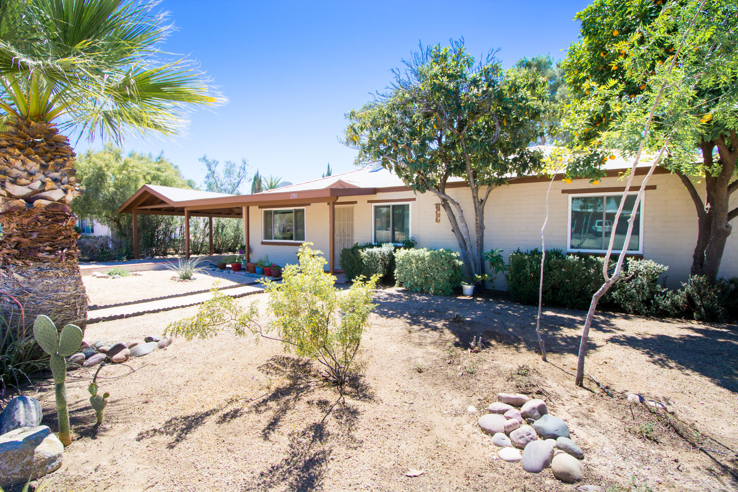 Central Broadmoor neighborhood is ideally located near Reid Park, El Con Mall, new Natural Grocers and five minutes from University of Arizona. 3 bedroom 2 bath home retains original charm with remodeled baths and kitchen. Updated kitchen has Samsung & LG appliances, high gloss concrete counters and custom cabinets. Rear yard has smaller walled area for kids or pets and large space for gardens, guest house or RV. Live in the heart of Tucson and walk or bike to all you could ever want. Home warranty covers first year for buyer.